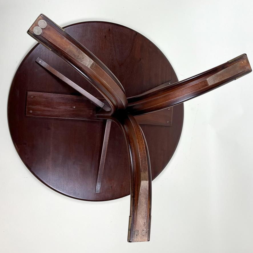 Mid-20th Century Frits Henningsen. A Cuban mahogany circular pedestal  table. For Sale