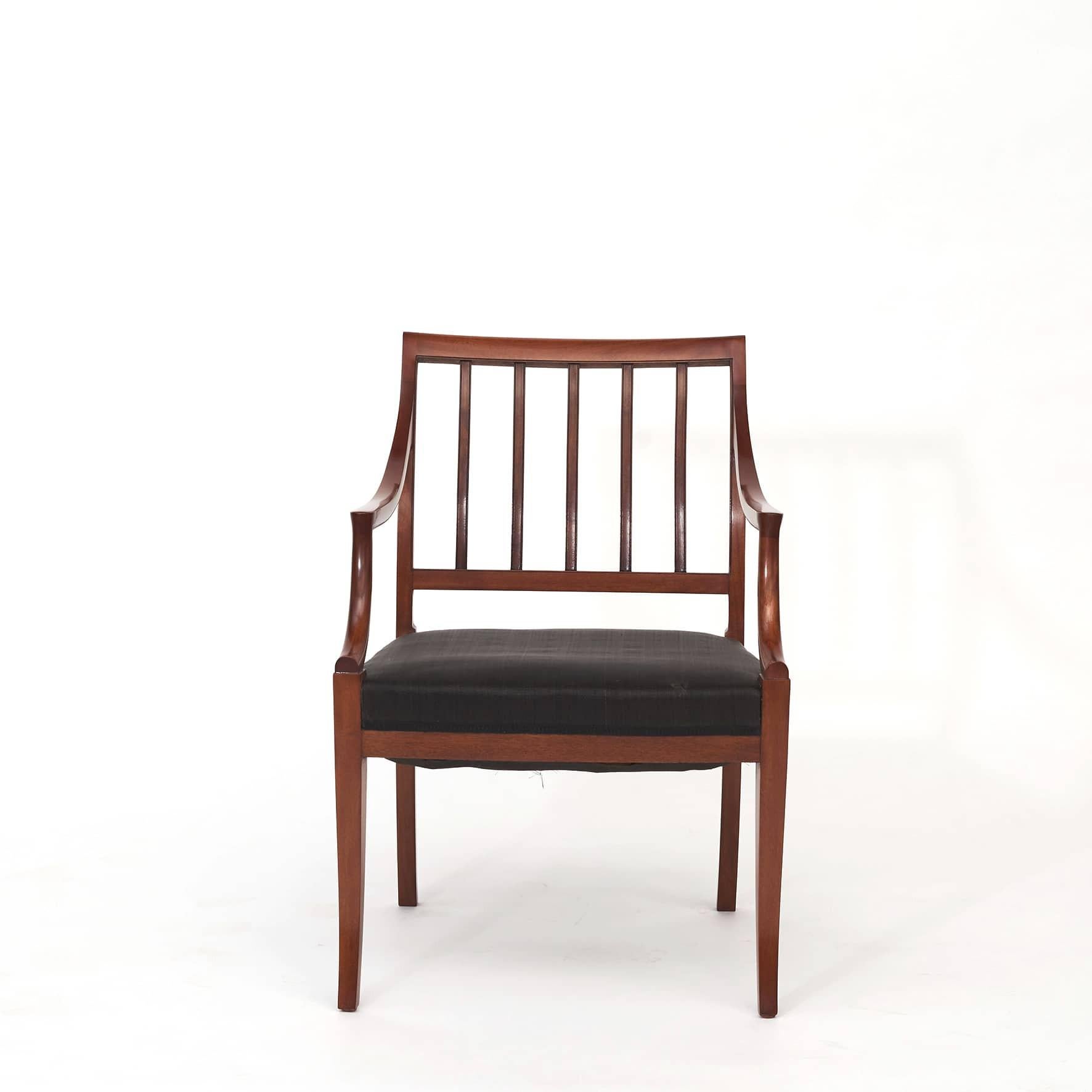 Frits Henningsen 1889-1965.
Desk arm chair in solid mahogany, seat with original horse hair upholstery.
Designed in 1930-1950.
Frits Henningsen was both a designer and a cabinet-maker. He cared deeply about quality, and was uncompromising in his