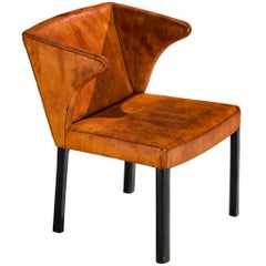 Sillón Frits Henningsen de piel de níger coñac patinada
