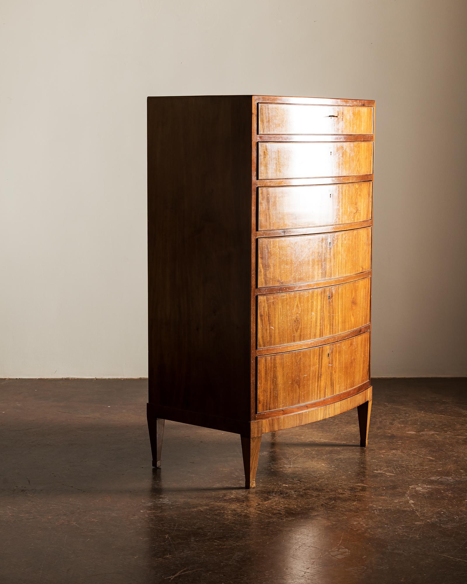 A gorgeous tall chest with elegant, simple lines in mahogany by Danish Cabinetmaker, Frits Henningsen. original key included.
