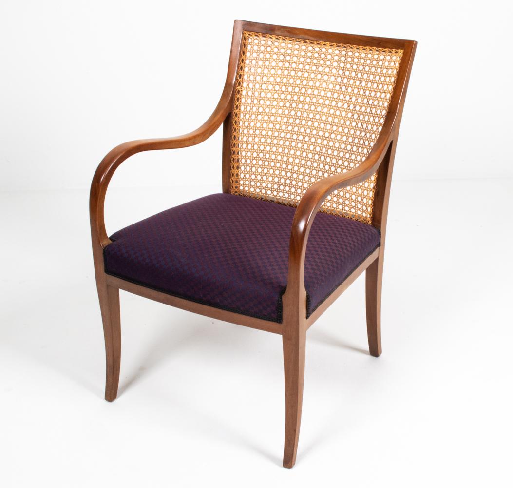 A handsome Danish mid-century armchair, designed by furniture maker and designer Frits Henningsen (1889–1965), c. 1940's. Both the proprietor of a furniture-making workshop with a team of cabinetmakers in central Copenhagen as well as the designer