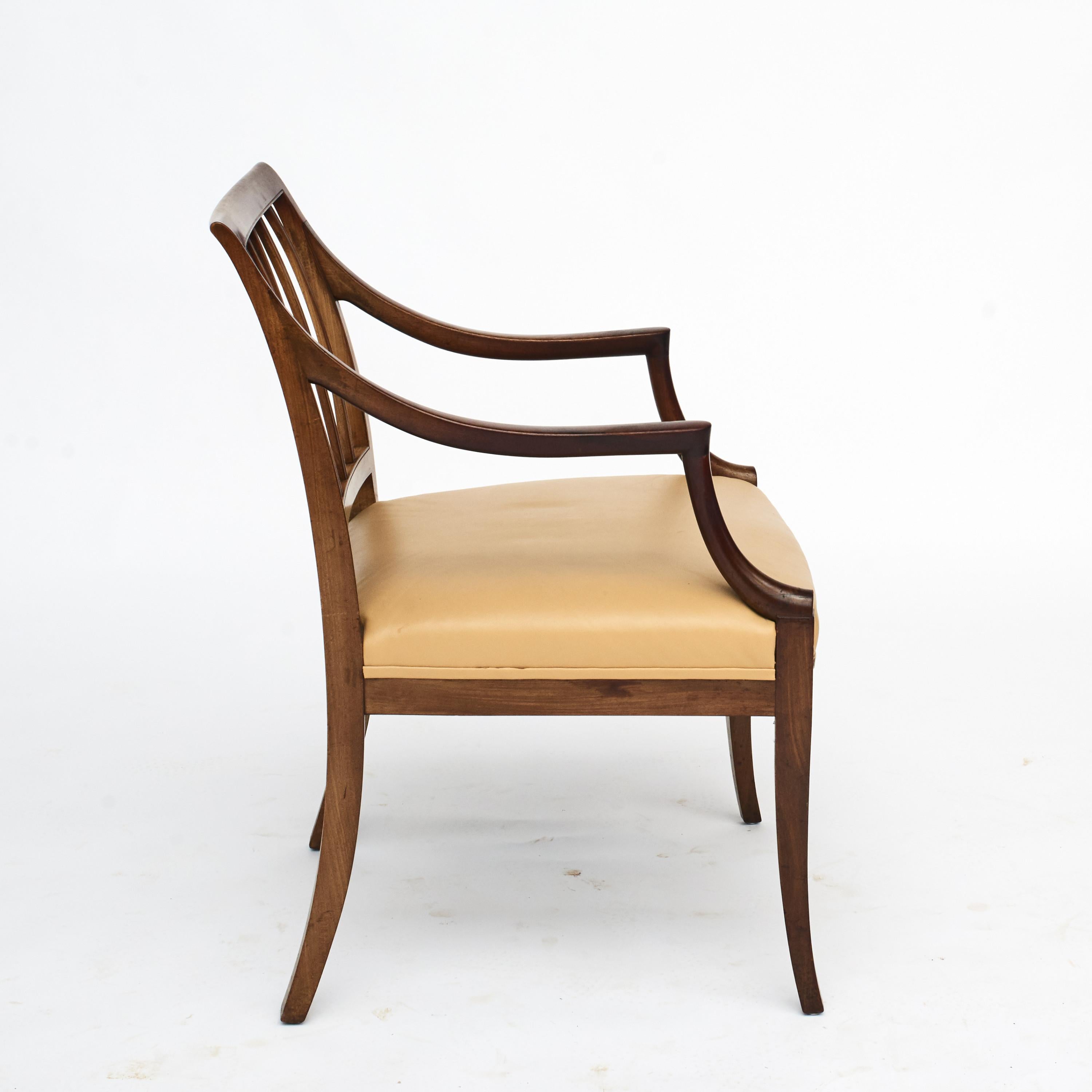 Frits Henningsen 1889-1965.
Desk arm chair in solid mahogany, seat with light brown leather. Designed in 1930-1950.
Frits Henningsen was both a designer and a cabinet-maker. He cared deeply about quality, and was uncompromising in his
