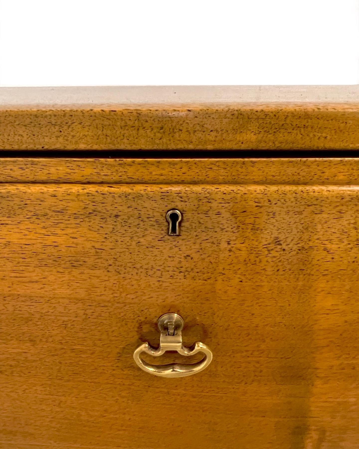 Frits Henningsen, rare walnut tobacco chest with one drawer and brass handles in English manner. The chest has one big compartment in the drawer and has been carefully refinished and the brass handles polished. The chest is as many of Frits