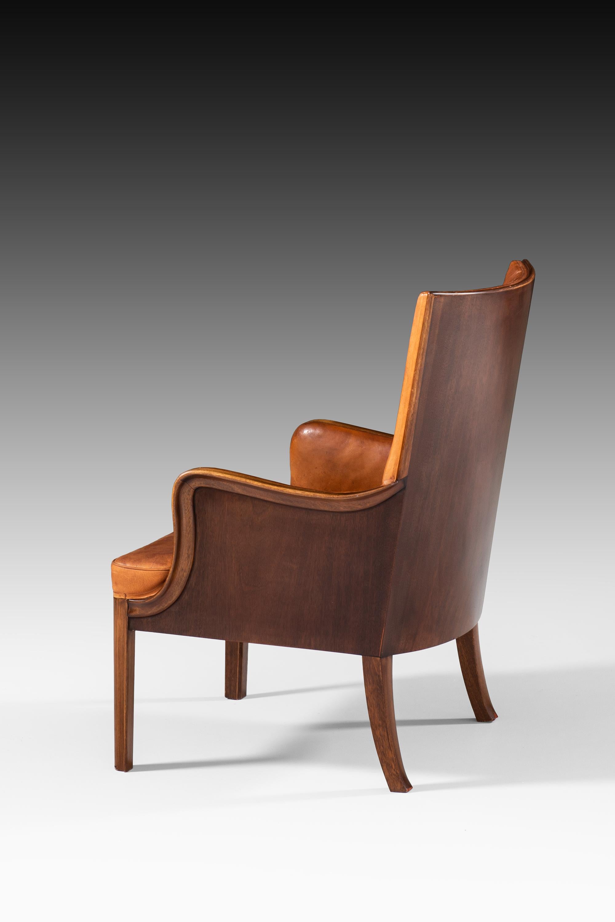 Mid-20th Century Frits Henningsen Easy Chair Produced by Cabinetmaker Frits Henningsen in Denmark For Sale