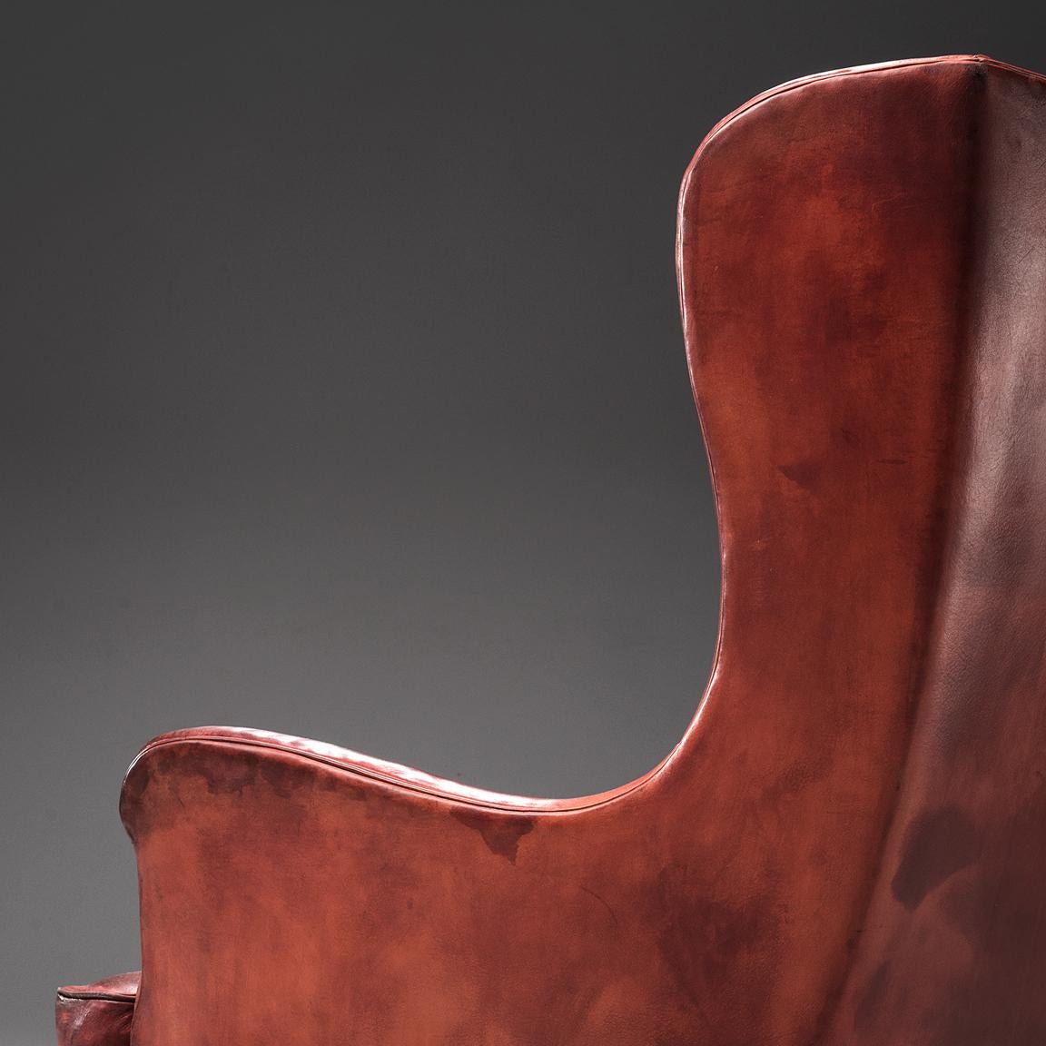 burgundy chair and ottoman