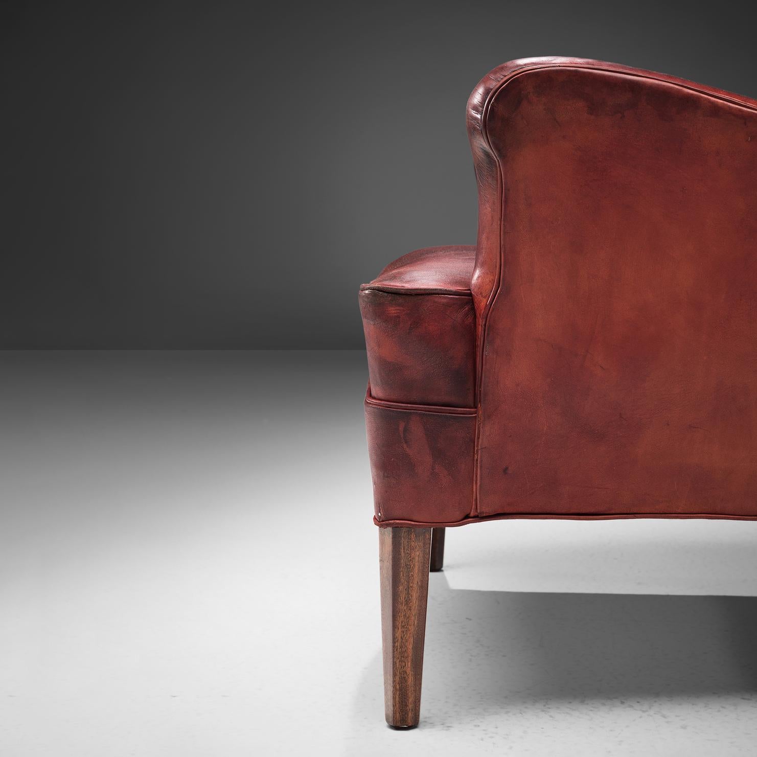 Mid-20th Century Frits Heningsen Lounge Chair with Ottoman in Original Burgundy Leather