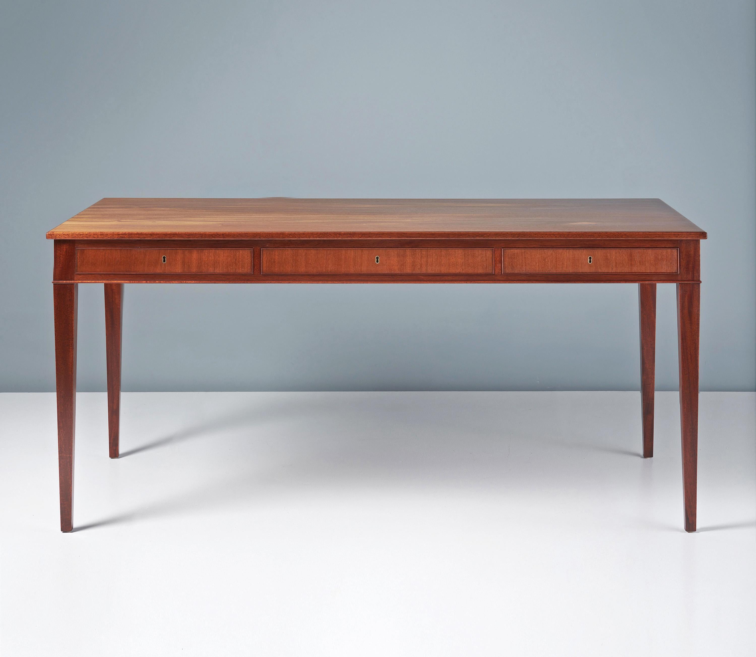 Frits Henningsen - Writing Desk, c1940s

Rarely seen design from the master cabinetmaker of the early Danish Modern period: Frits Henningsen. Henningsen produced all of his designs at his own workshop in limited volumes. This exquisite, classical