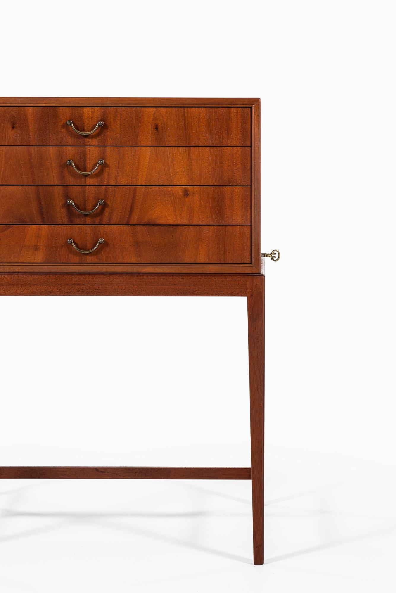 Danish Frits Henningsen Side Table in Mahogany and Brass Produced in Denmark