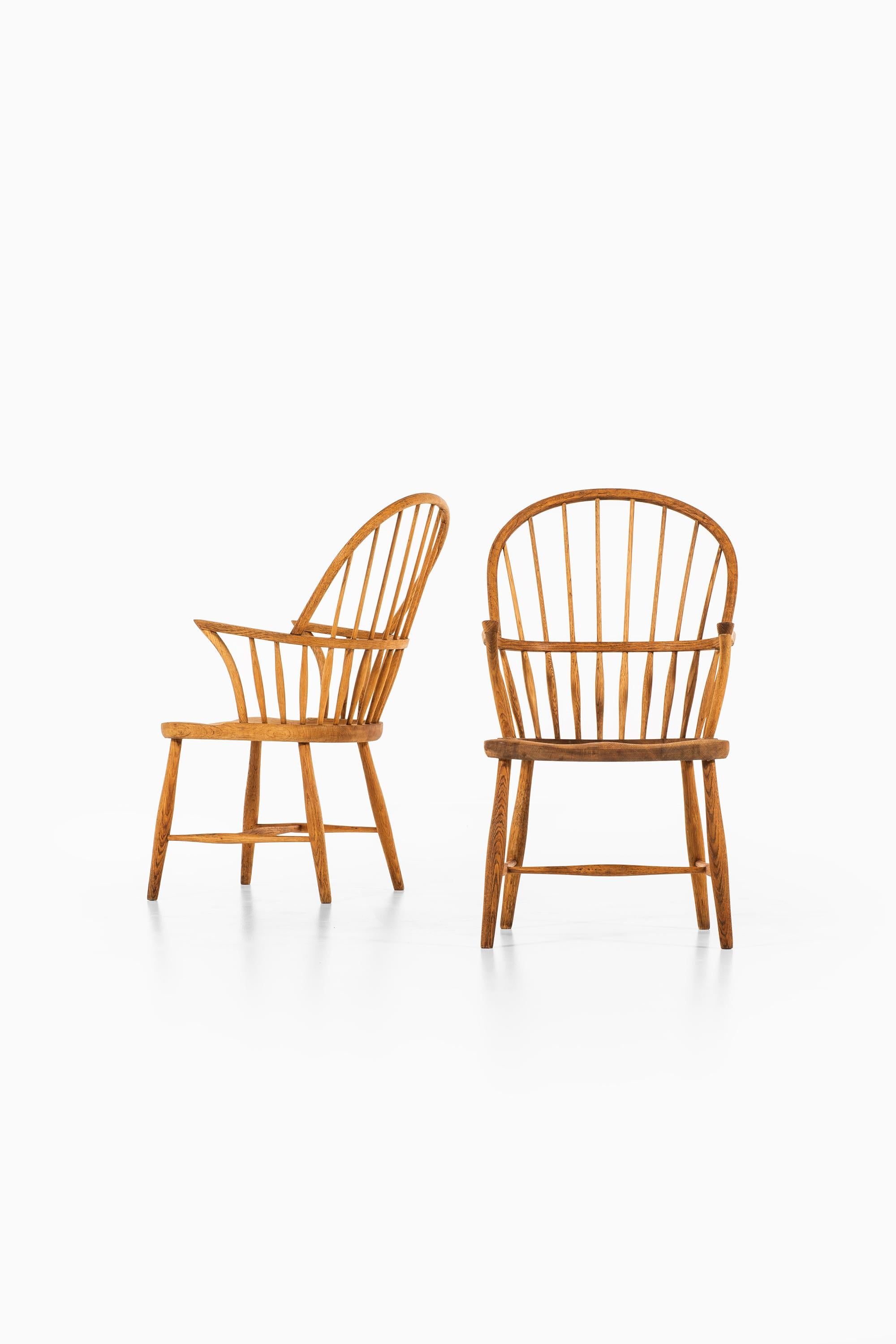 Rares chaises de salle à manger Windsor modèle CH 18A conçues par Frits Henningsen. Produit par Carl Hansen & Søn au Danemark.