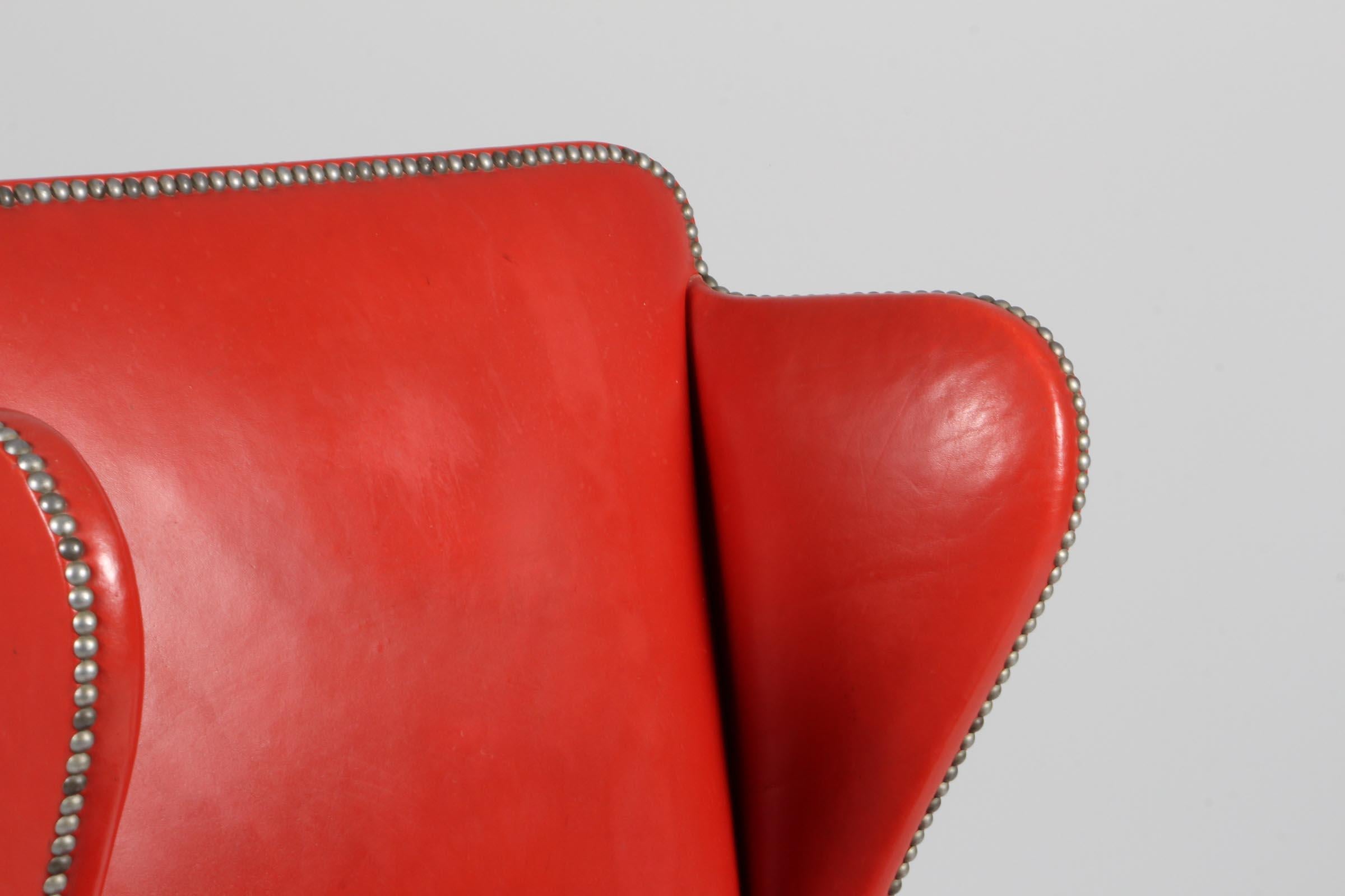 Scandinavian Modern Frits Henningsen, Wingback Chair with Original Patinated Red Leather, 1940s