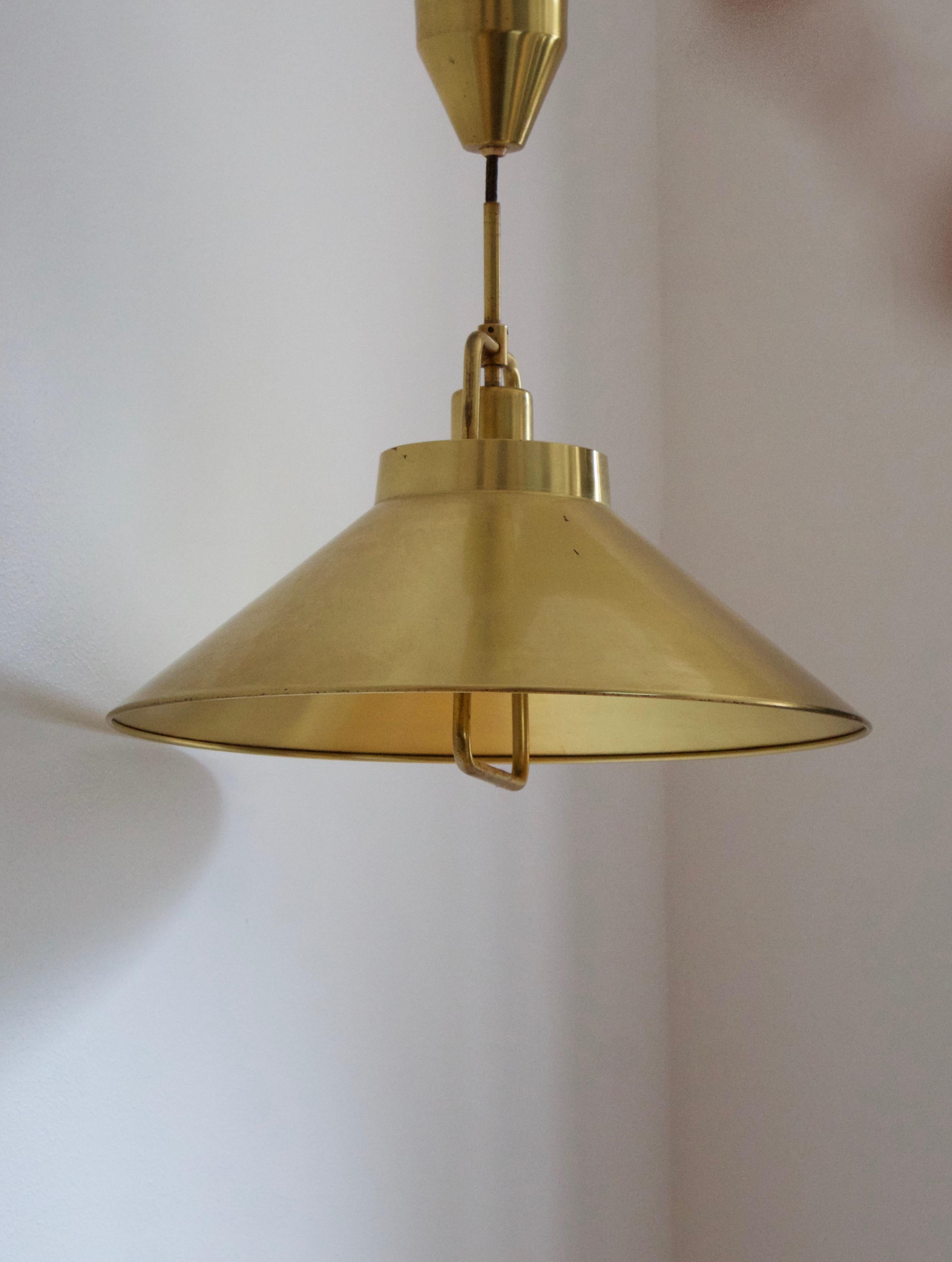 A pendant light designed by Danish architect Frits Schlegel in 1967. Produced by Lyfa. 

In brass. Stated height includes full drop as illustrated in primary image.