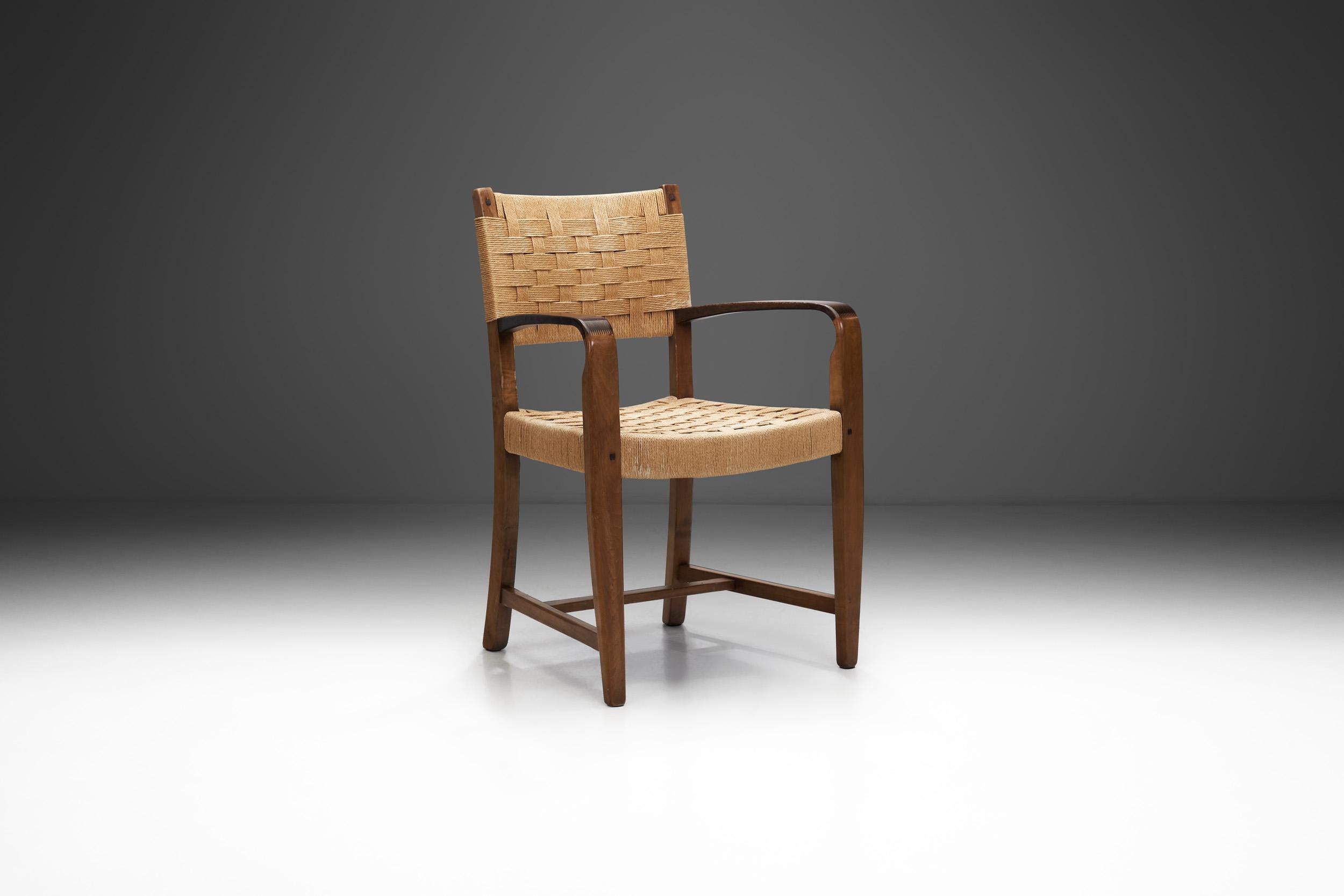 The Mid-Century Modern era cemented the design principles of quality, functionality, and an unadorned, understated look for future pieces in Belgium as well. Accordingly, this chair created in the 1970s is defined by its materials, the finely worked