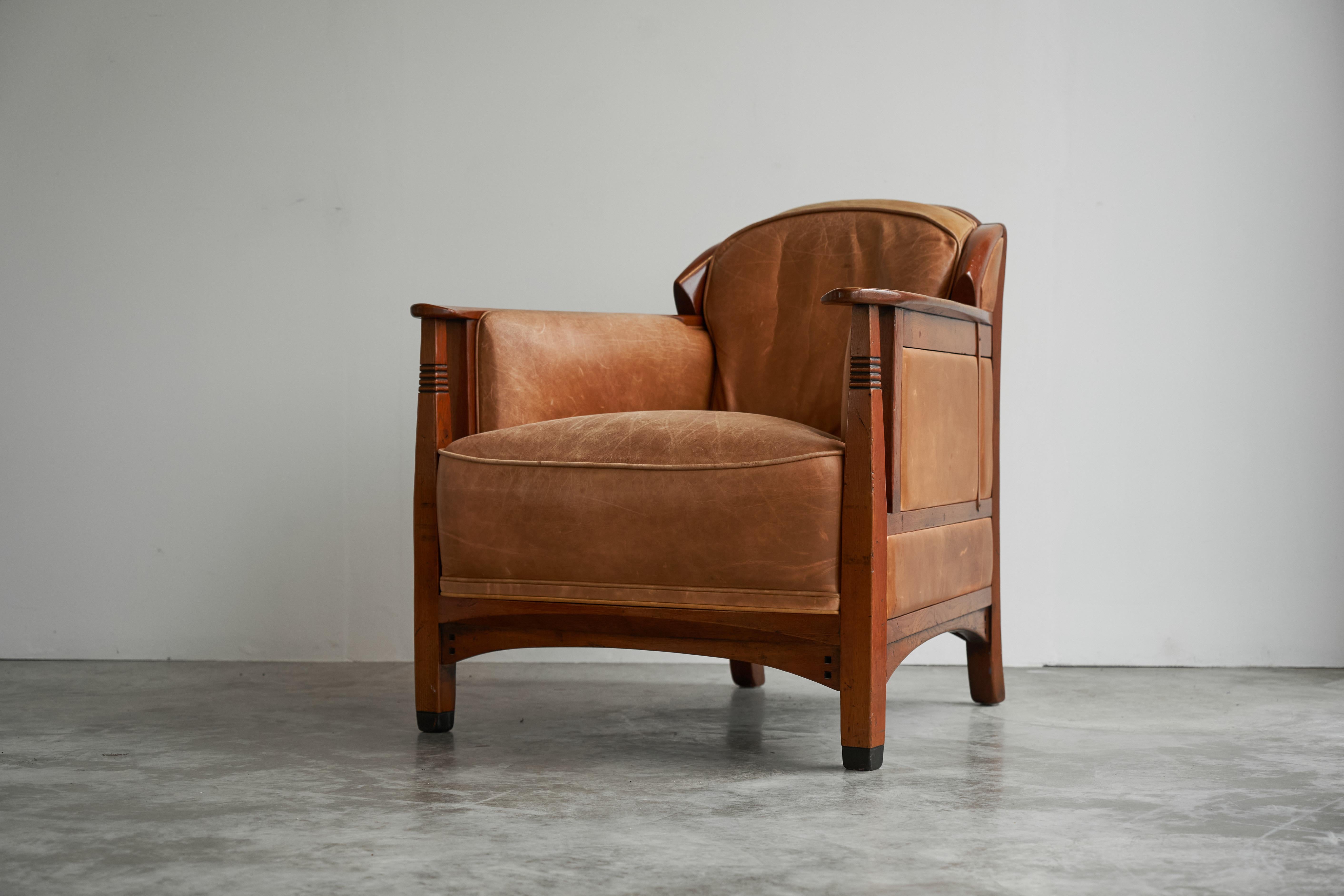 Frits Schuitema Art Deco Armchair in Solid Oak and Cognac Leather, The Netherlands, late 20th / beginning 21st century.

This luxurious Art Deco armchair was designed and made by Frits Schuitema, in solid oak and cognac leather. The renowned