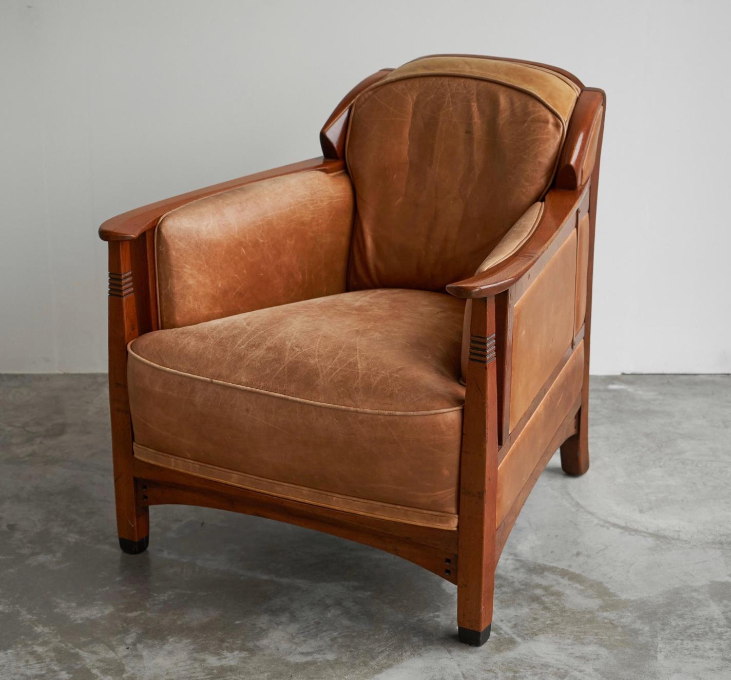 Frits Schuitema Art Deco Armchair in Solid Oak and Cognac Leather, The Netherlands, late 20th / beginning 21st century.

This luxurious Art Deco armchair was designed and made by Frits Schuitema, in solid oak and cognac leather. The renowned
