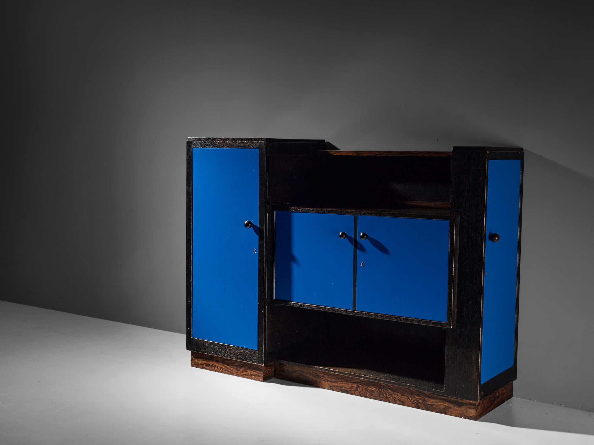 Frits Spanjaard for H. Pander & Zonen, sideboard, lacquered oak, pau ferro veneer, beech, The Netherlands, late 1920s

This cabinet is designed by Frits Spanjaard and belongs to the Hague School, a movement that emphasized geometric shapes, simple