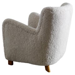 Fritz Hansen "1669" Arm Lounge Chair in Sheepskin Produced in Denmark, 1940s