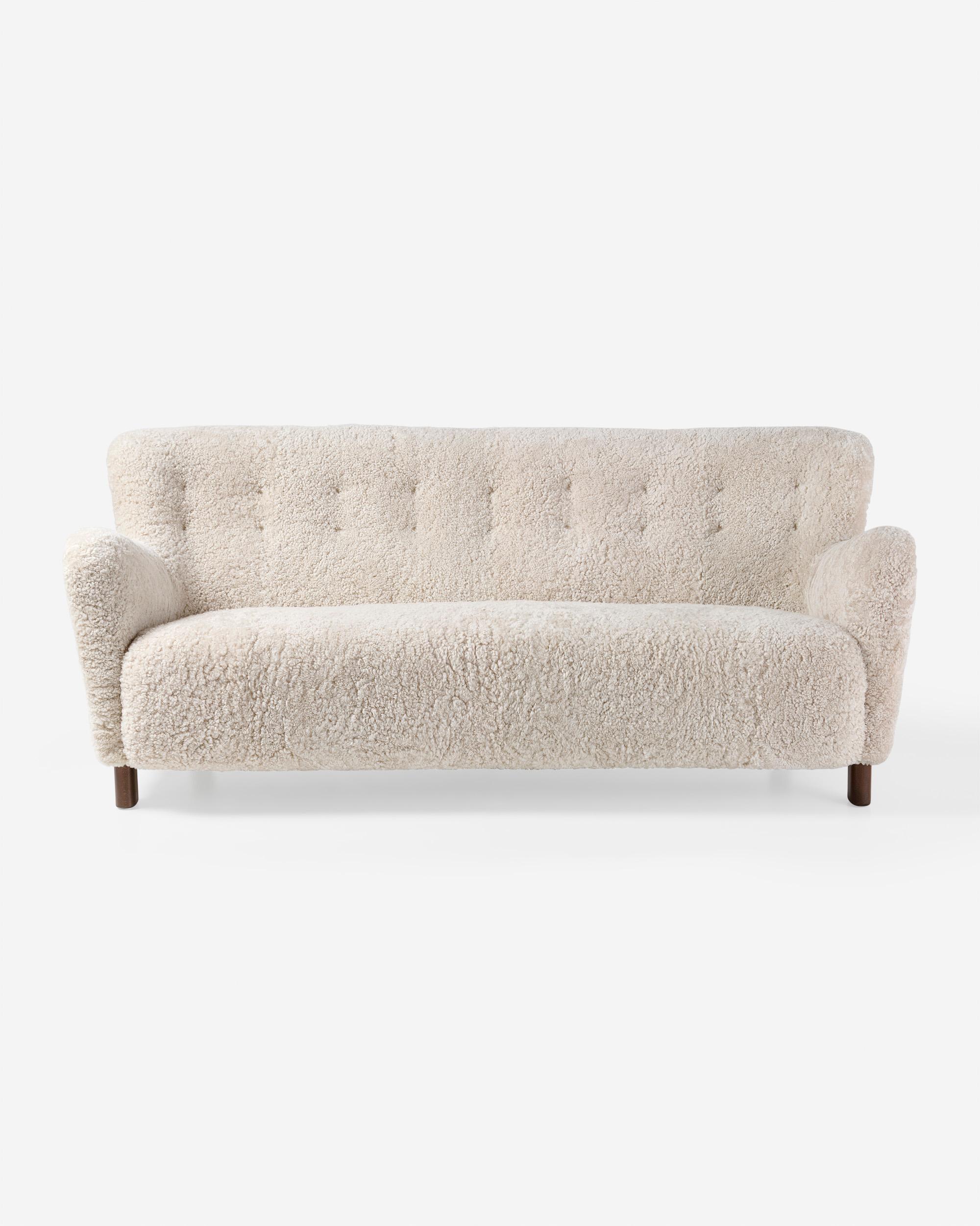 Fritz Hansen - Model 1669A Sofa, c1940s

This iconic sofa from the 1669 series was produced by Danish master cabinetmakers Fritz Hansen in Denmark and has become one of the most sought after and collectible sofas from the Danish Modern period. The