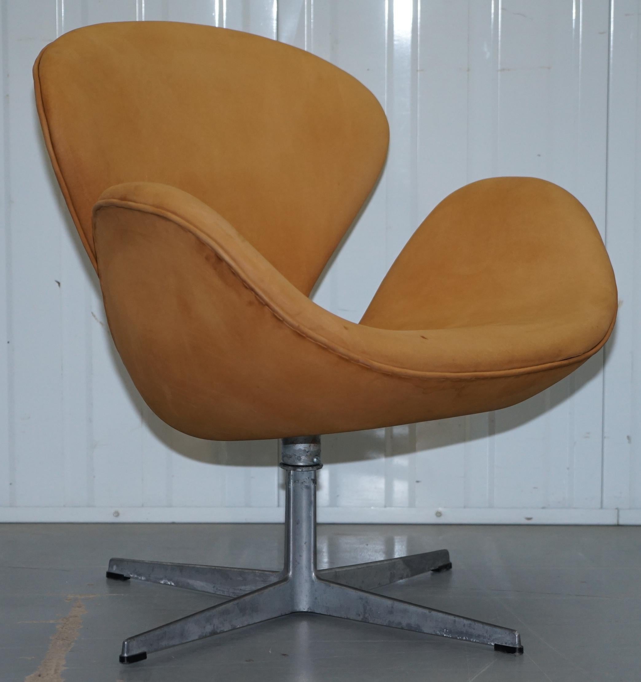 Wimbledon-Furniture
Wimbledon-Furniture is delighted to offer for sale this very rare original 1976 Fritz Hansen Swan armchair with matching Egg stool in brown suede leather 
Please note the delivery fee listed is just a guide, it covers within the