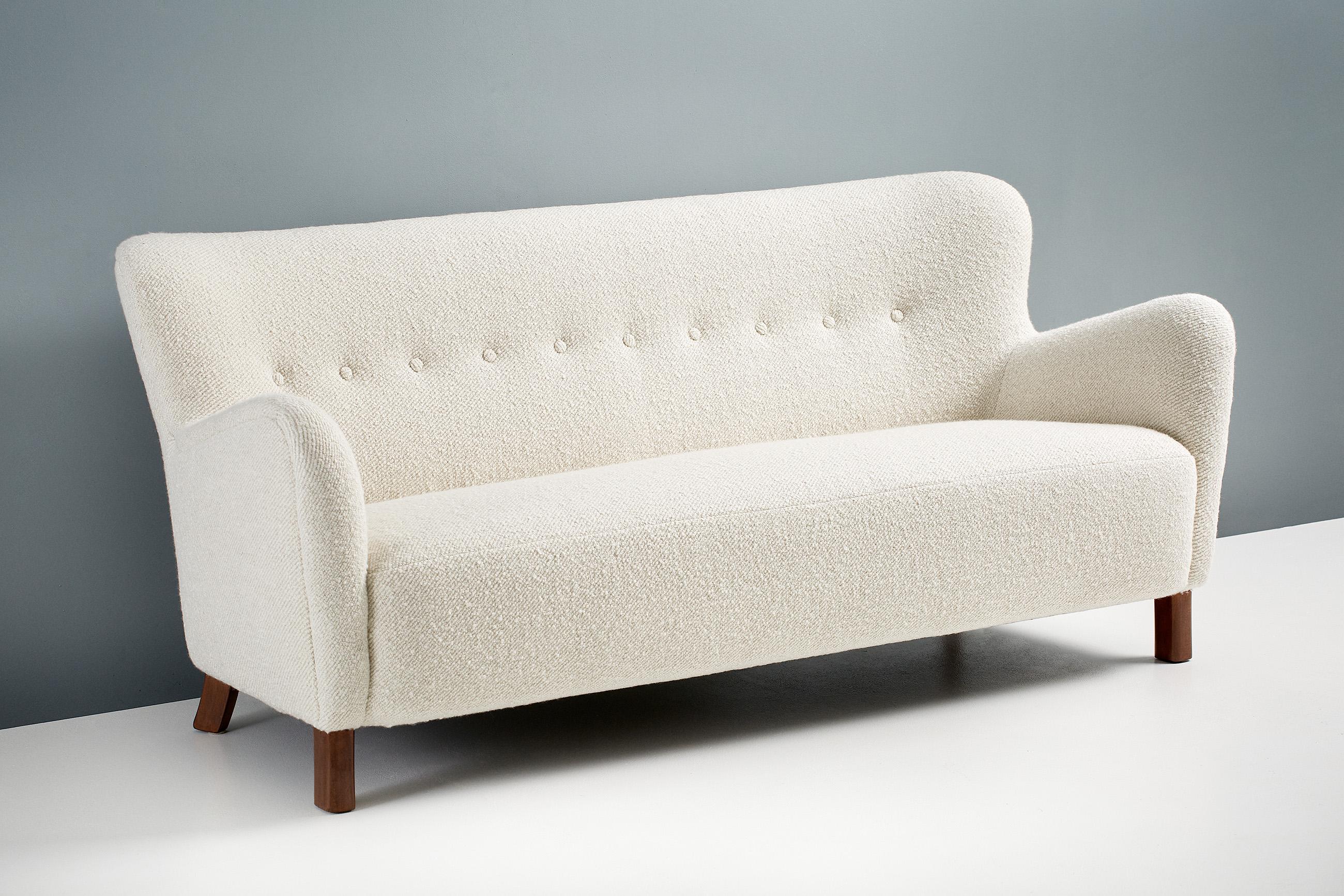 Danish Cabinetmaker

Sofa, c1940s

A variation of the iconic Fritz Hansen 1669 sofa, produced in Denmark in the 1940s. This sofa has been reupholstered in new wool boucle from Dedar Milan. 

 