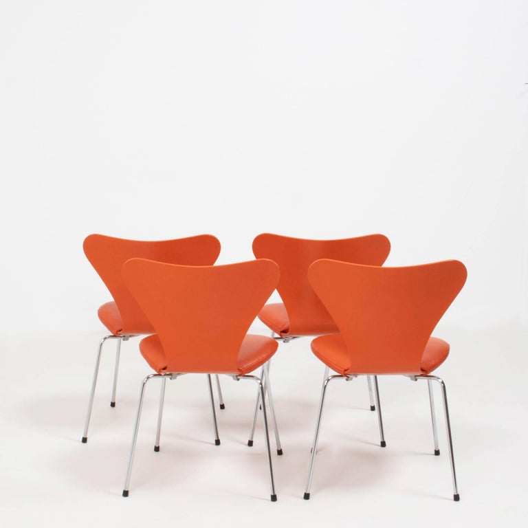 Danish Fritz Hansen by Arne Jacobsen Orange Leather Series 7 Dining Chairs, Set of 4 For Sale
