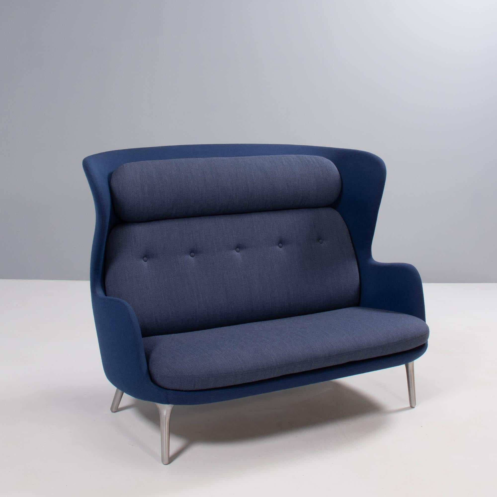 Designed by Jaime Hayon for Fritz Hansen, the RO sofa is named after the Danish word for ‘tranquility’.

The soft curves of the sofa combined with the high backrest creates a cocoon like environment.

The shell of the sofa is upholstered in blue