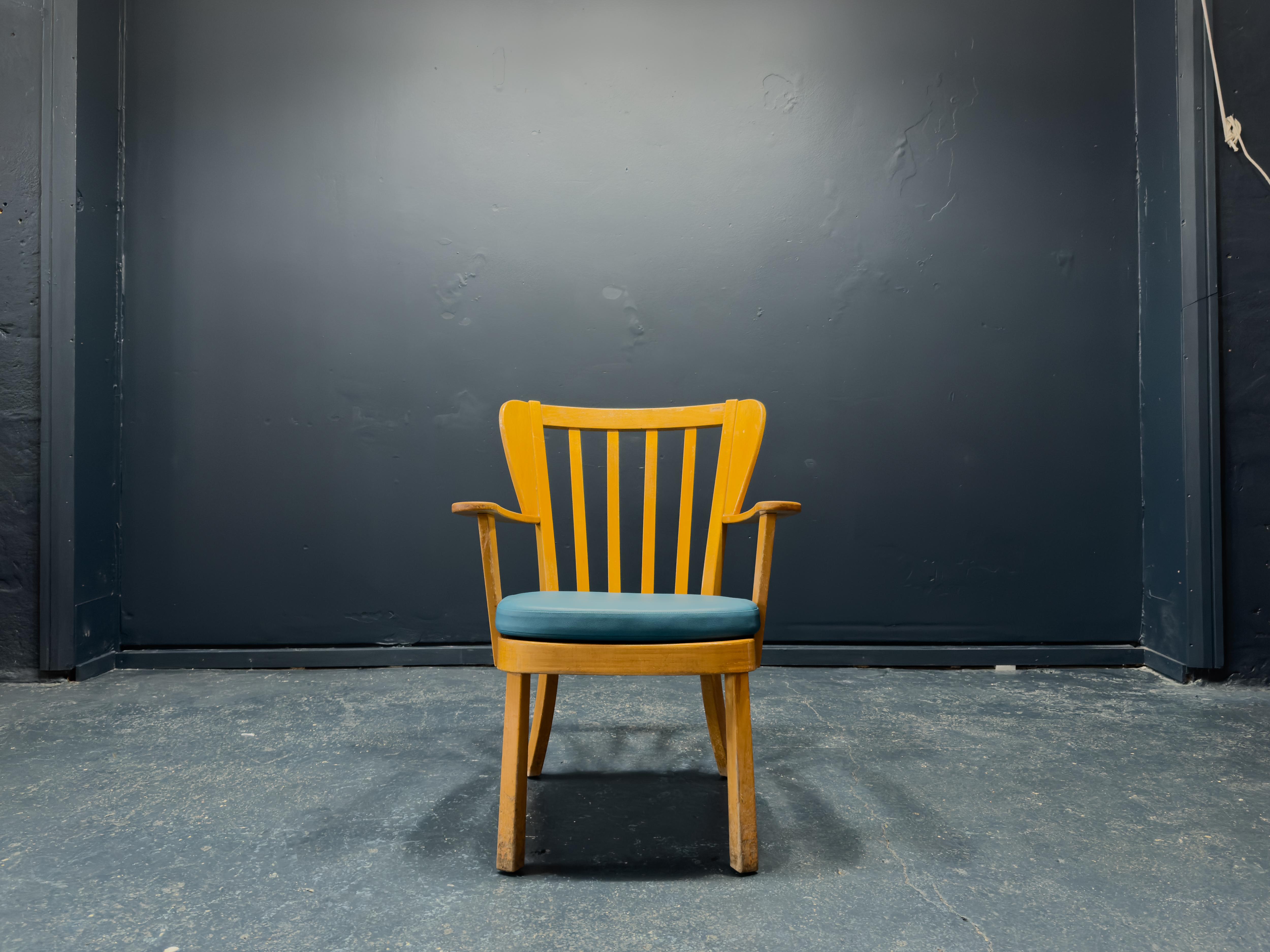 Designed by Christian E. Hansen in the 1940s, the son of Fritz Hansen iconic Danish cabinet maker, this chair is a classic and acclaimed piece of designed. Titled the 'Canada' chair, the piece features a combination of solid and laminated beech. The