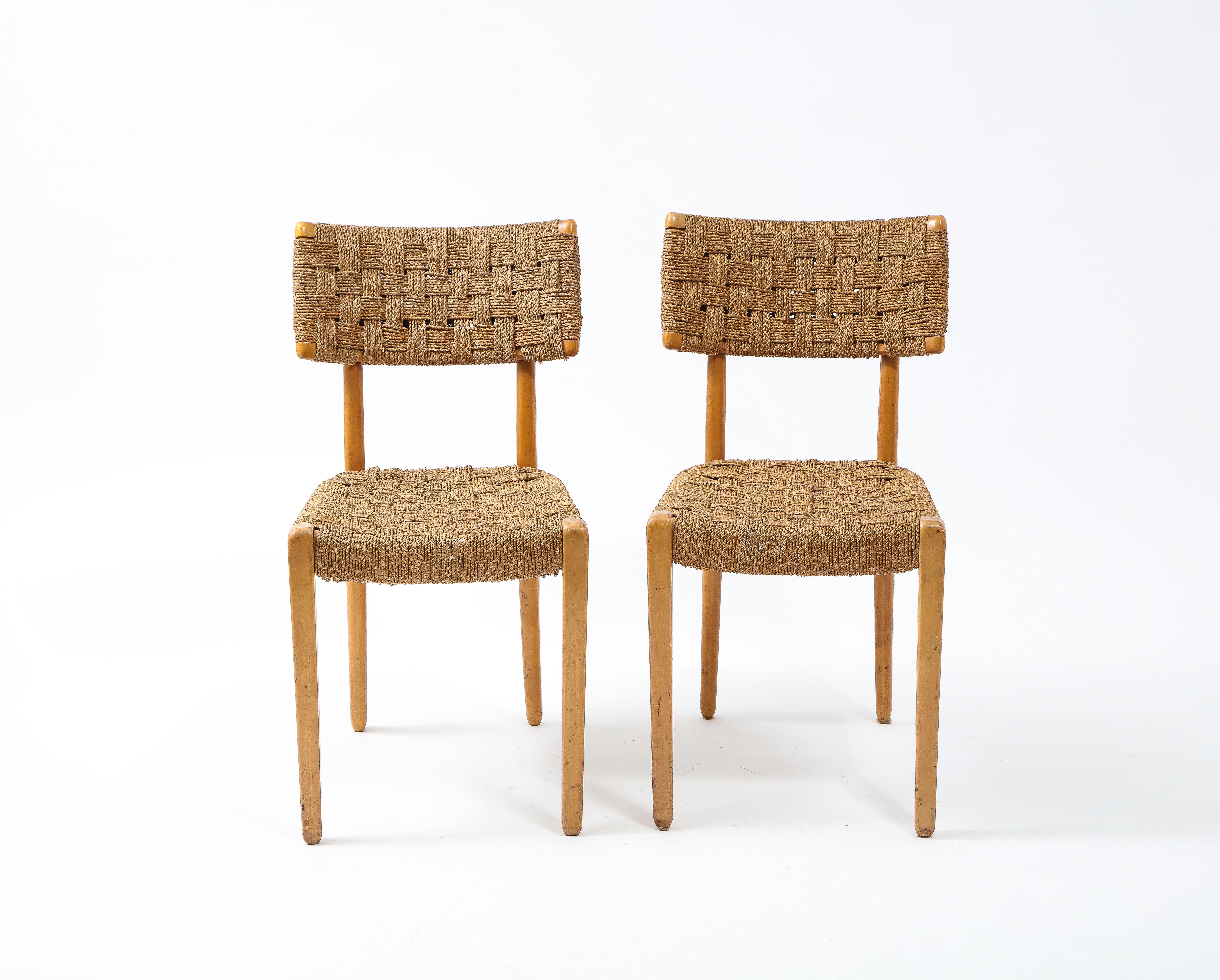 A rare and early pair of dining chairs designed by Karl Schrøder for Fritz Hansen in the early 30's. Very few of his works for the company remain today. In exceptional vintage conditions.