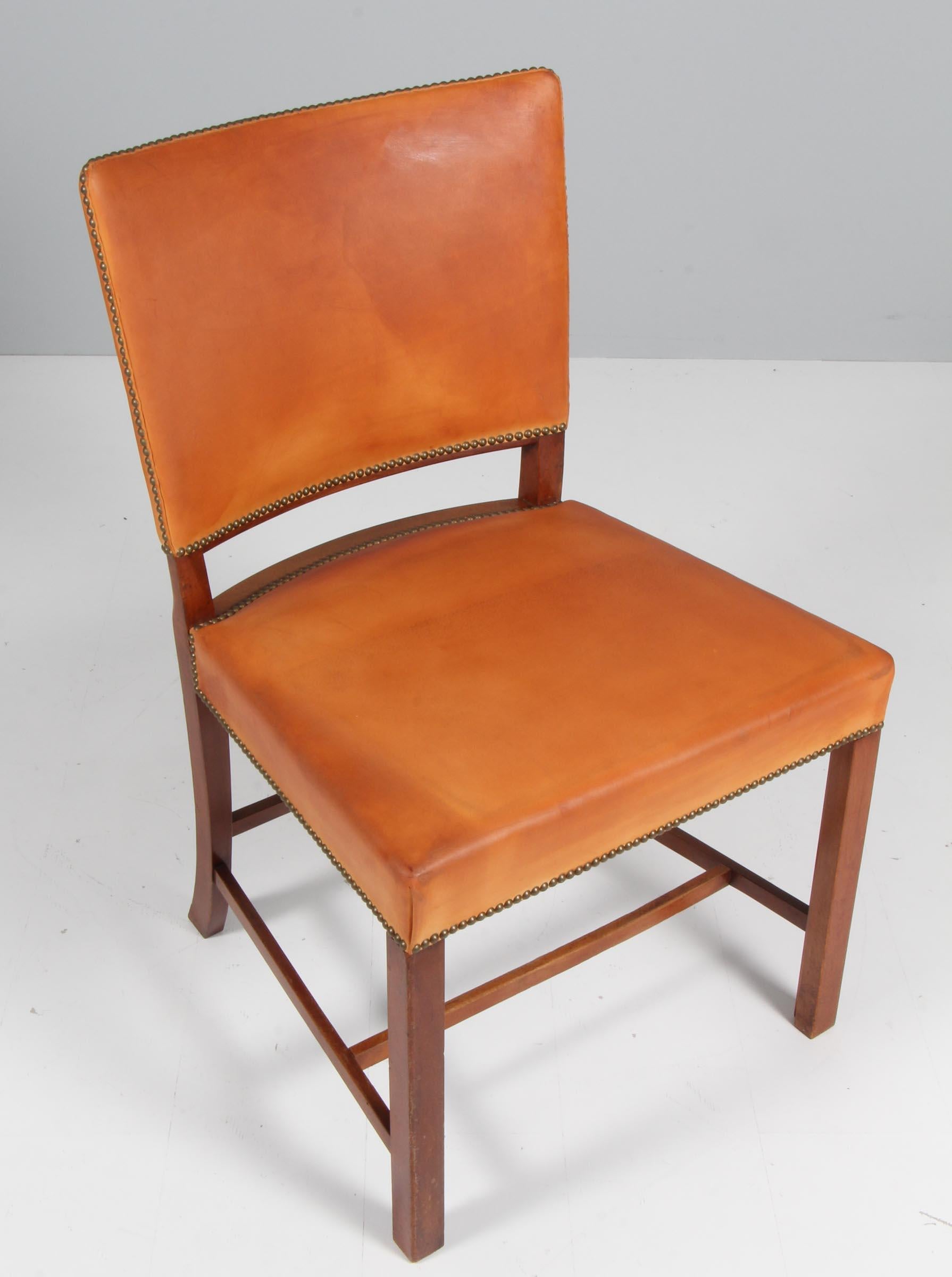Fritz Hansen & Ivan Schlechter side chair with frame of stained beech. Original upholstered with patinated nature leather with brass nails.

Made in the 1940s.