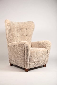 Fritz Hansen, Large High Back Wing Chair in Shearling and Oak, Denmark, 1940s