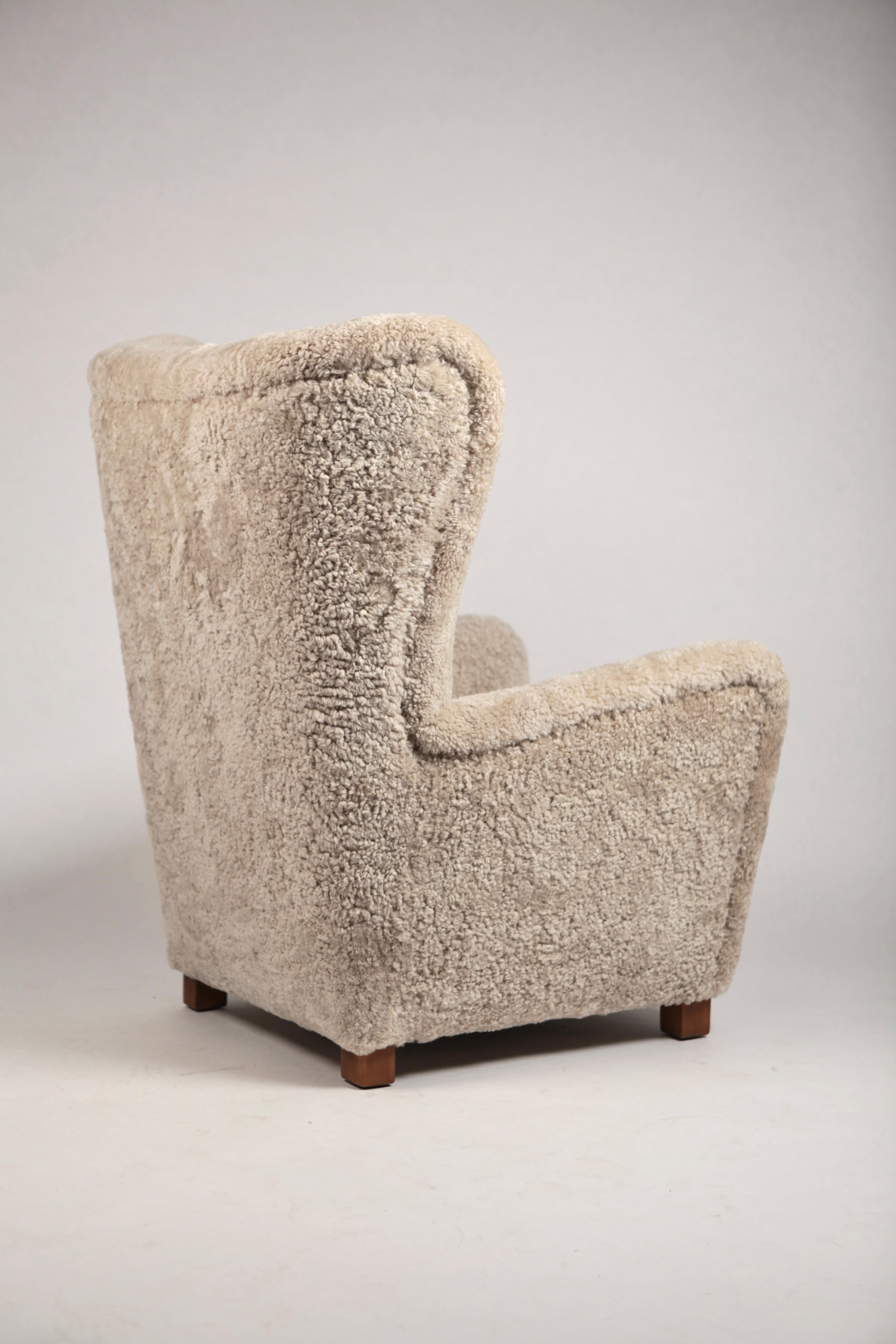 Mid-20th Century Fritz Hansen, Large High Back Wing Chair in Shearling and Oak, Denmark, 1940s