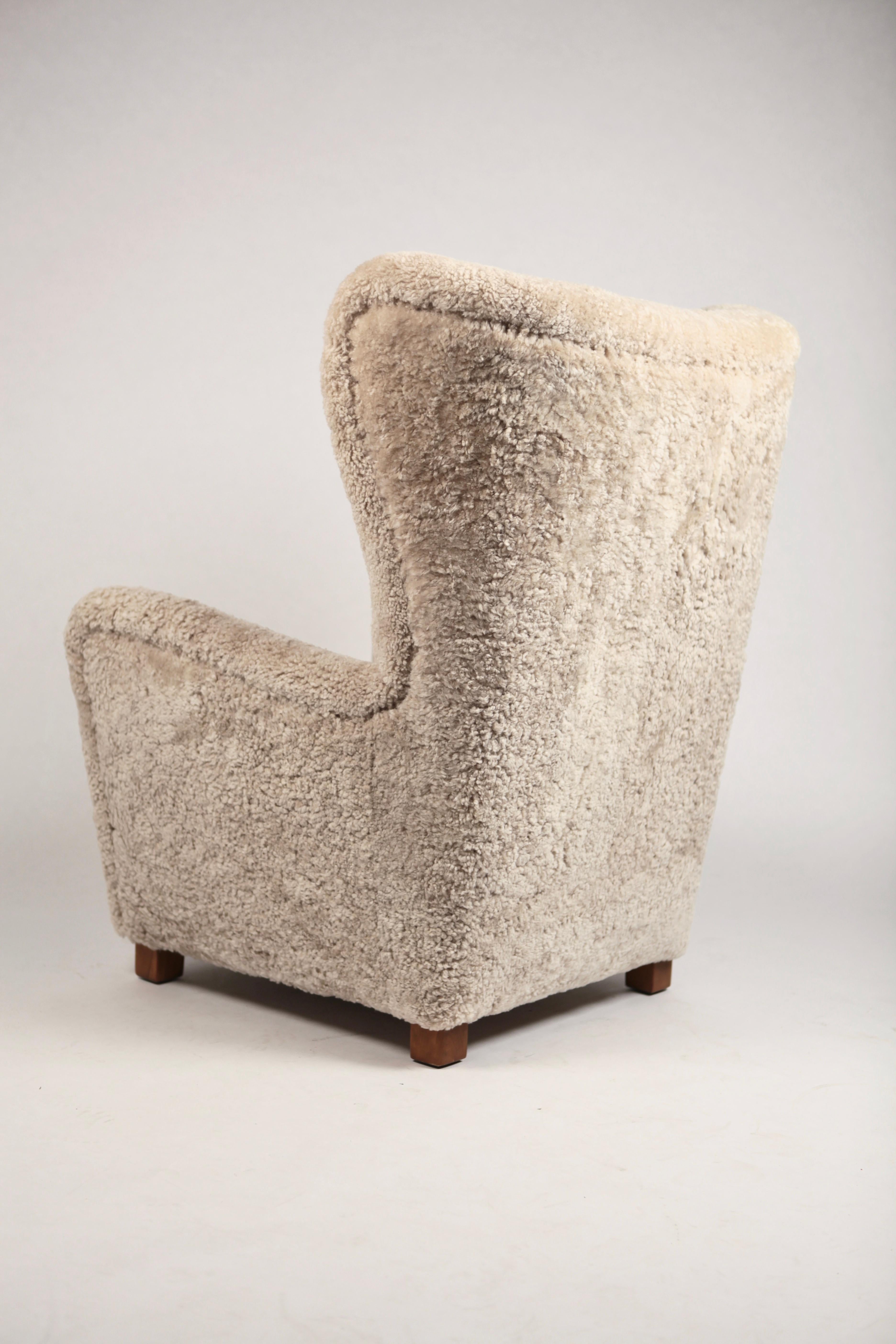 Fritz Hansen, Large High Back Wing Chair in Shearling and Oak, Denmark, 1940s 1