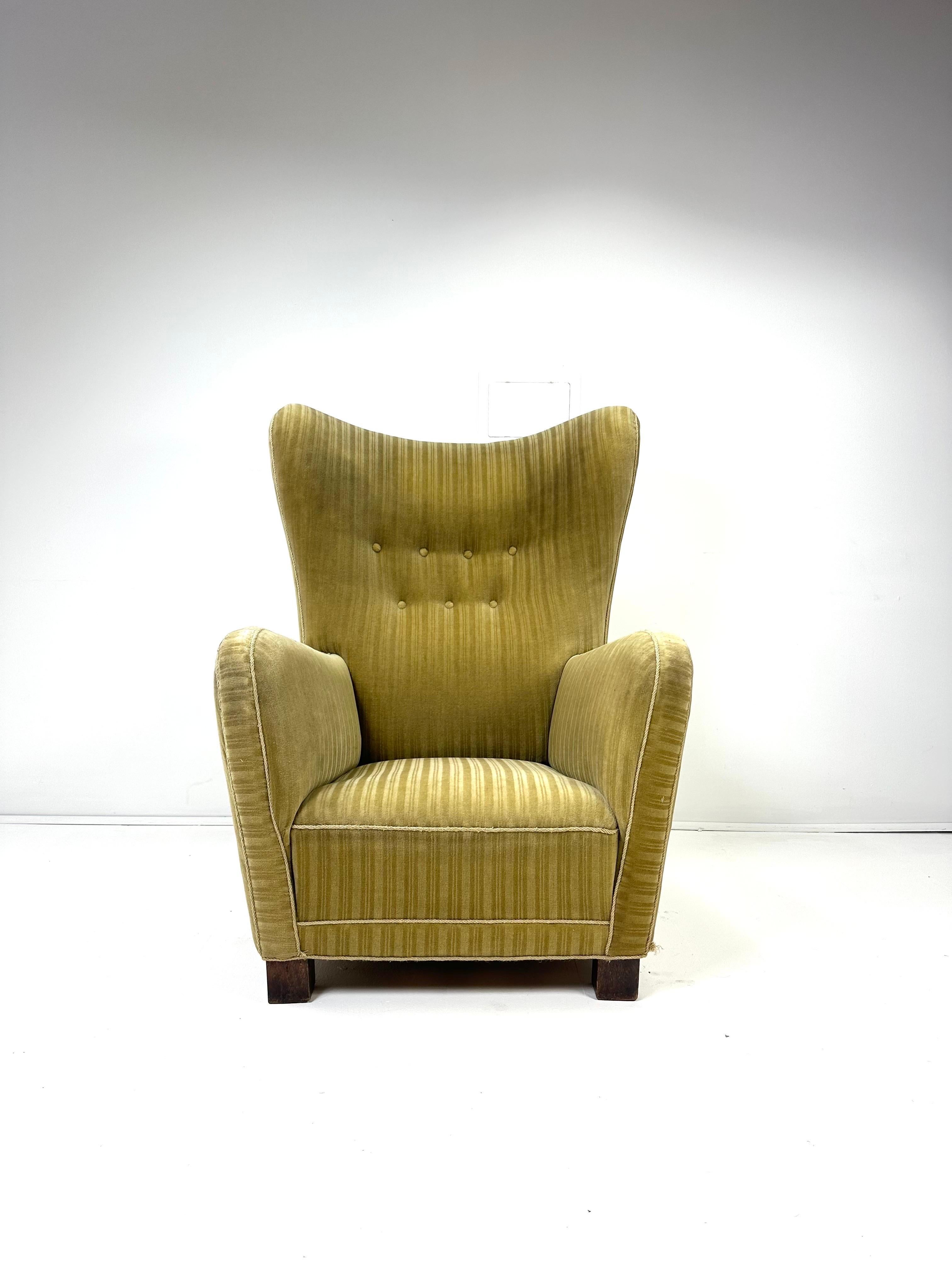 Chaise longue de Fritz Hansen, modèle 1672
Chaise de salon de grande taille avec des pieds en chêne. 
Danemark, vers les années 1930.