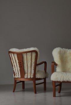 Fritz Hansen Lounge Chairs "No. 1588" Elm, Cane & Sheepskin, Denmark, 1940s