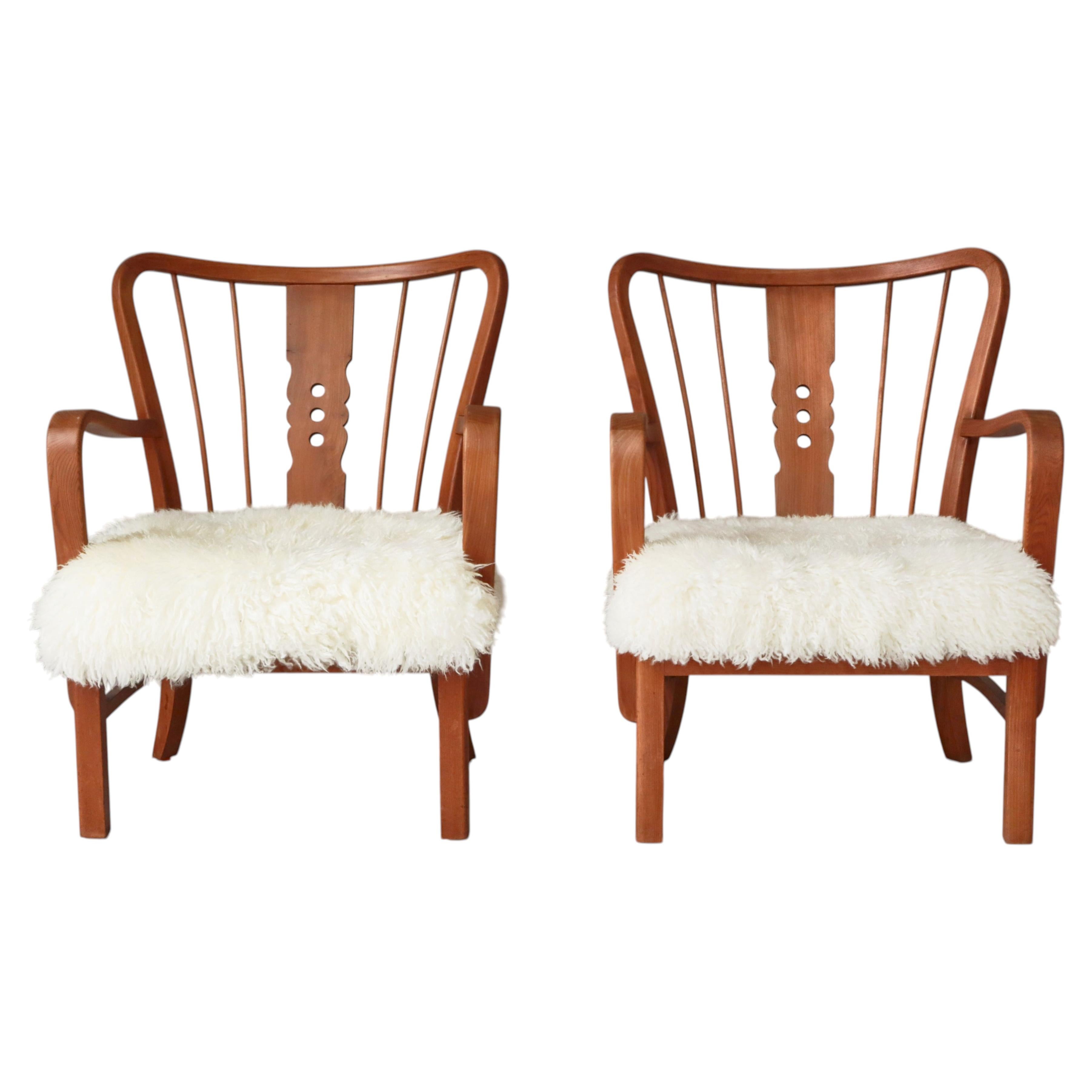 Fritz Hansen Lounge Chairs "No. 1588" Elm, Cane & Sheepskin, Denmark, 1940s
