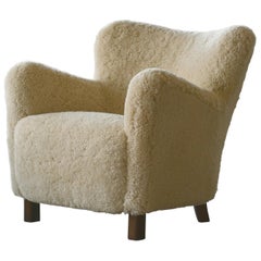 Fritz Hansen Model 1669 Lounge Chair in Beige Sheepskin Shearling, 1940s