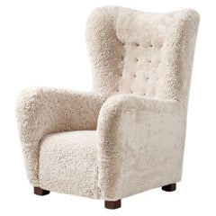 Fritz Hansen fauteuil à oreilles en peau de mouton modèle 1672, années 1940