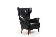 Fritz Hansen, model 8023 wingback lounge chair. Original patinated black leather