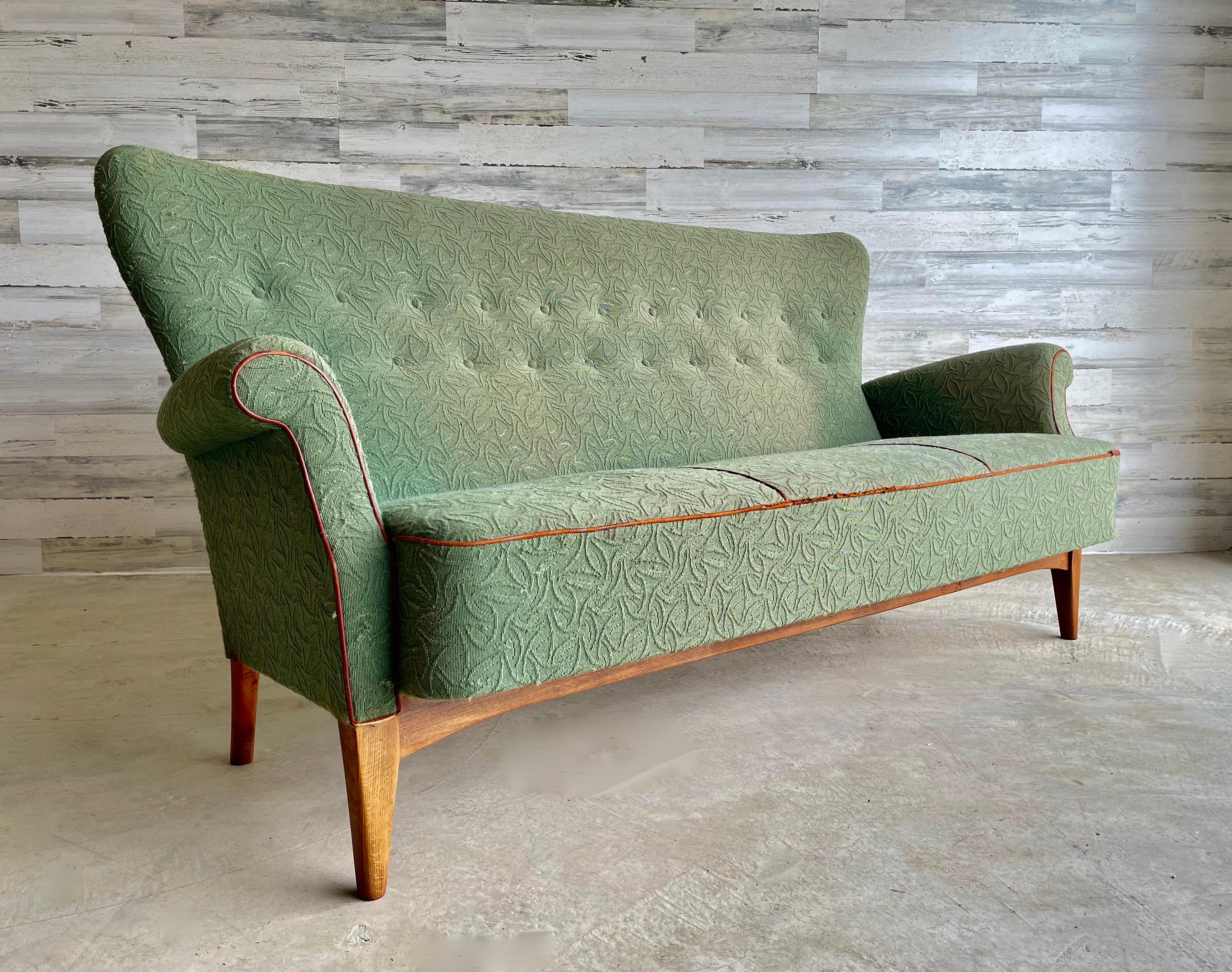 Fritz Hansen Model 8112 Wingback sofa. In original condition with the original stamp on the bottom. This sofa is very rare and will look great recovered in new upholstery.