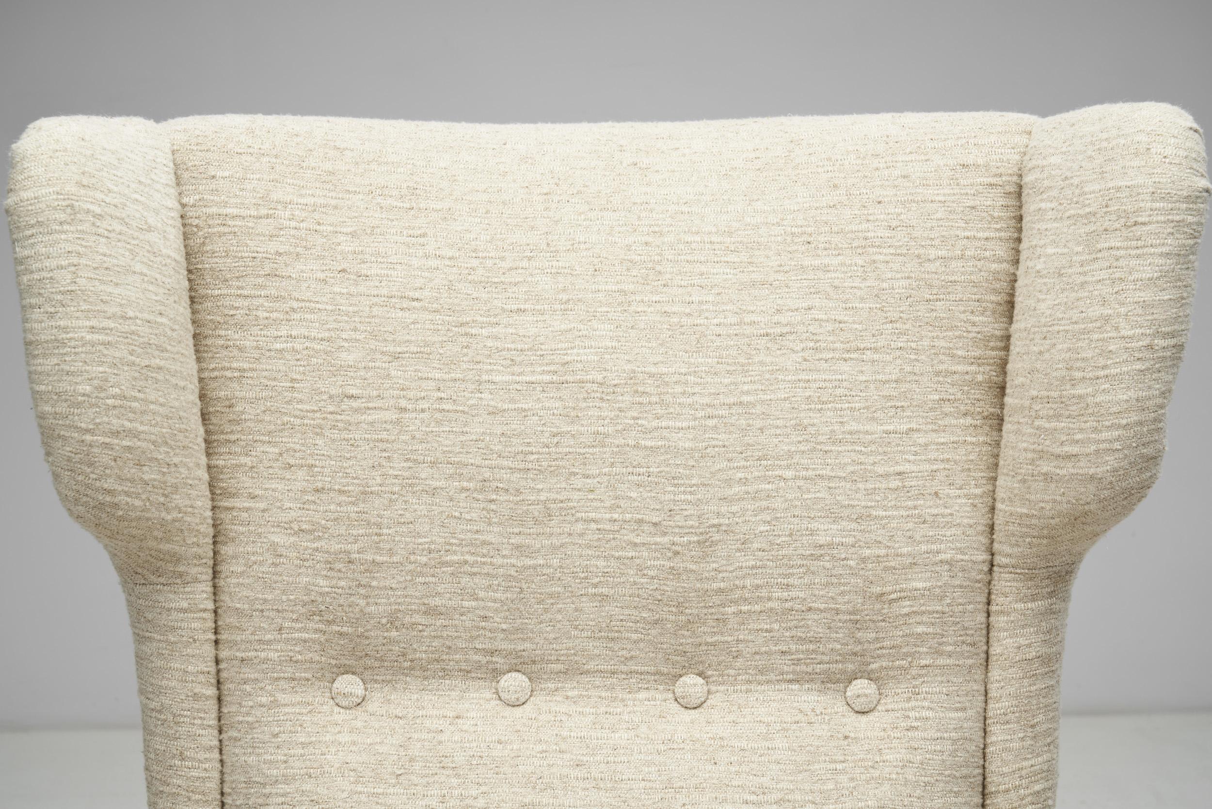 Poltrona a dondolo in bouclé Fritz Hansen modello 