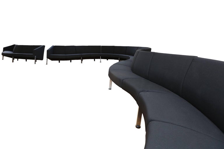 Postmodern sofa 
30 modular elements in black fabric, matte chromed steel.
Fritz Hansen, decision, 1986.

Six ends are available so we are able to divide into three sofas.
16 inwards elements, 12 outwards elements, four straight