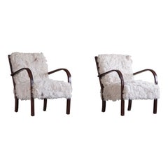 Fritz Hansen, Coppia di poltrone moderne danesi, rivestite in lana d'agnello, anni '30