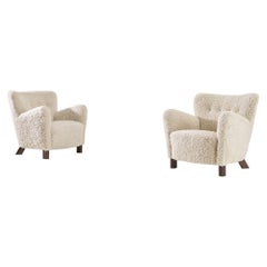 Fritz Hansen Pair of Easy Chairs in Sheepskin, Model 1669