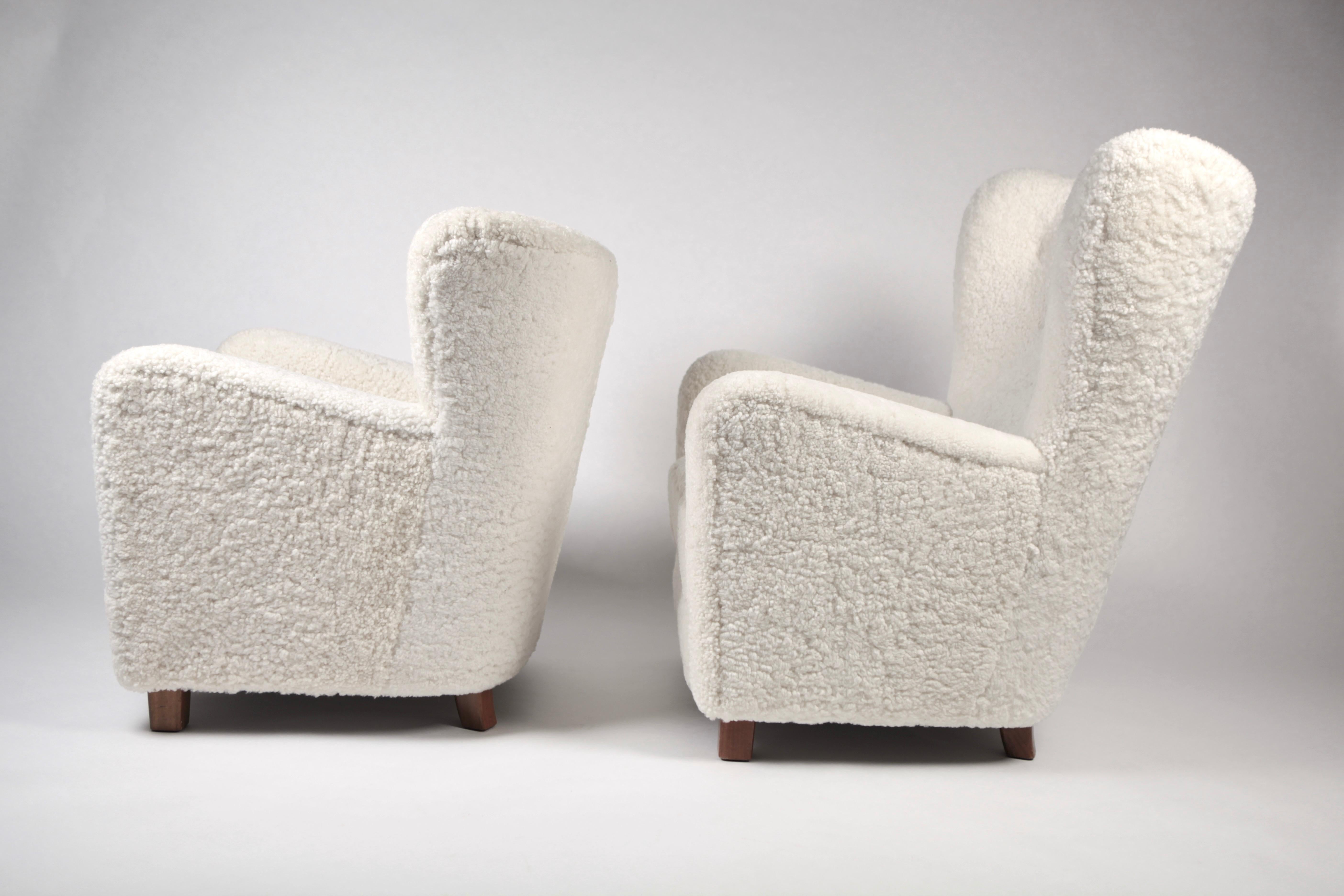 Mid-20th Century Fritz Hansen, Pair of High & Low Back Wing Chair in Shearling, Denmark, 1940s