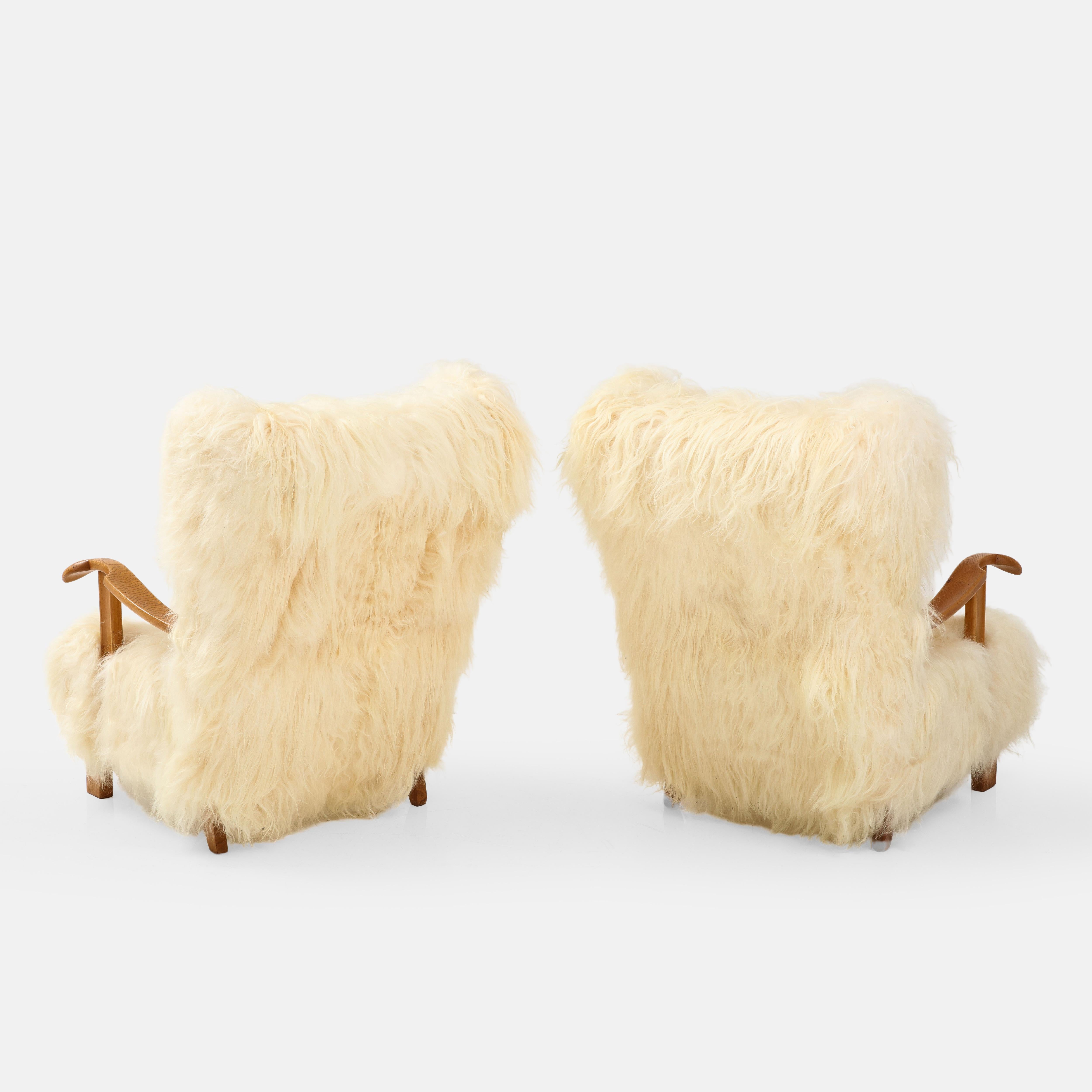 Lambskin Fritz Hansen Rare Pair of Wingback Lounge Chairs Model 1582 in Sheepskin, 1930s For Sale