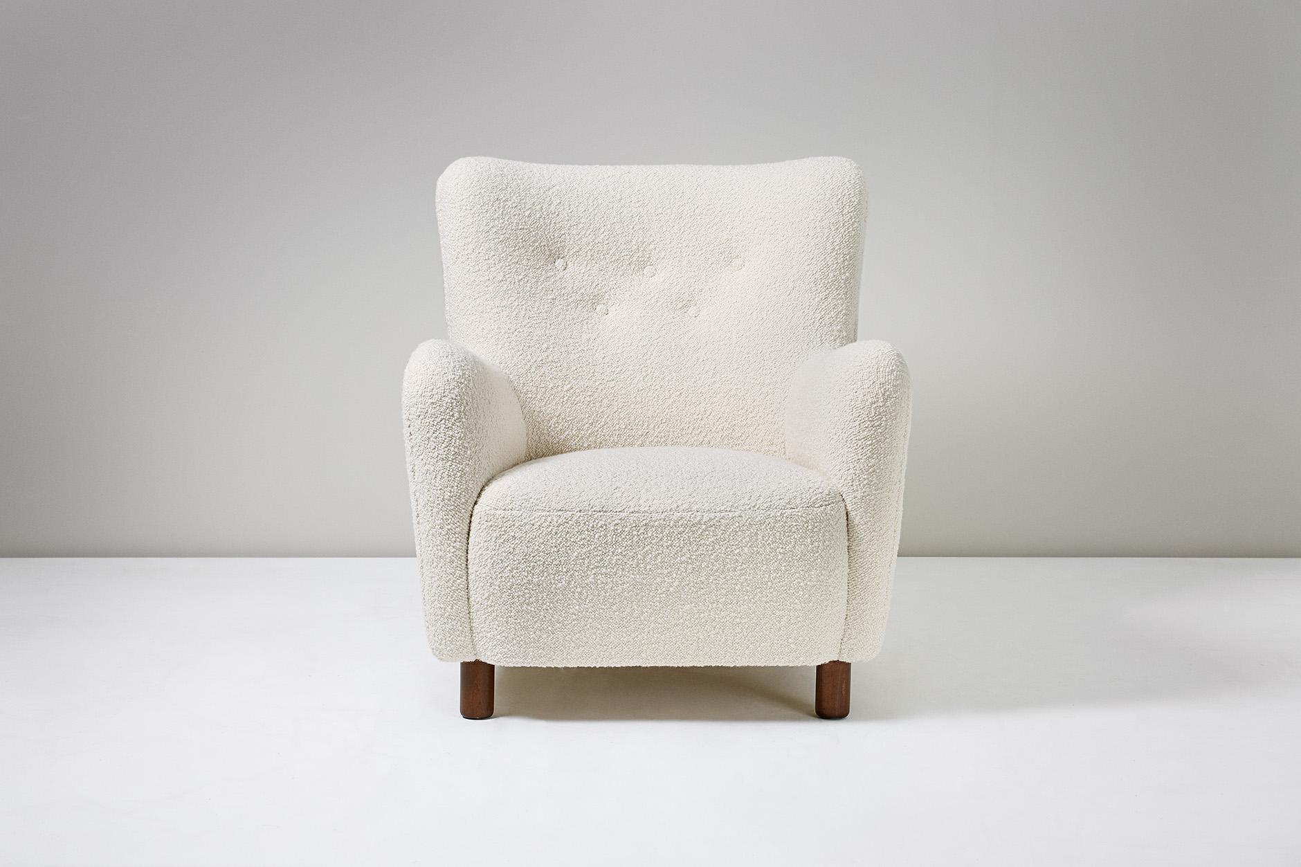 Fritz Hansen Style Armchair

Armchair, 1954

Armchair in the manner of Fritz Hansen, produced in Denmark by FDB Mobler. Stained beech legs with new Italian boucle wool fabric upholstery. 

Measures: H 73cm / D 68cm / W 69cm / SH 38cm.