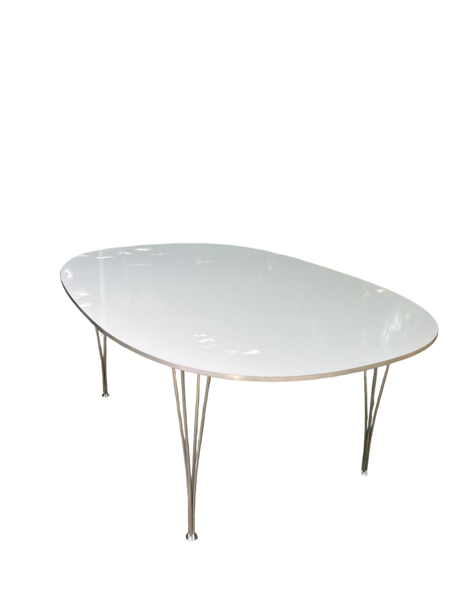 Chrome Fritz Hansen 'Super-Ellipse' table from Denmark