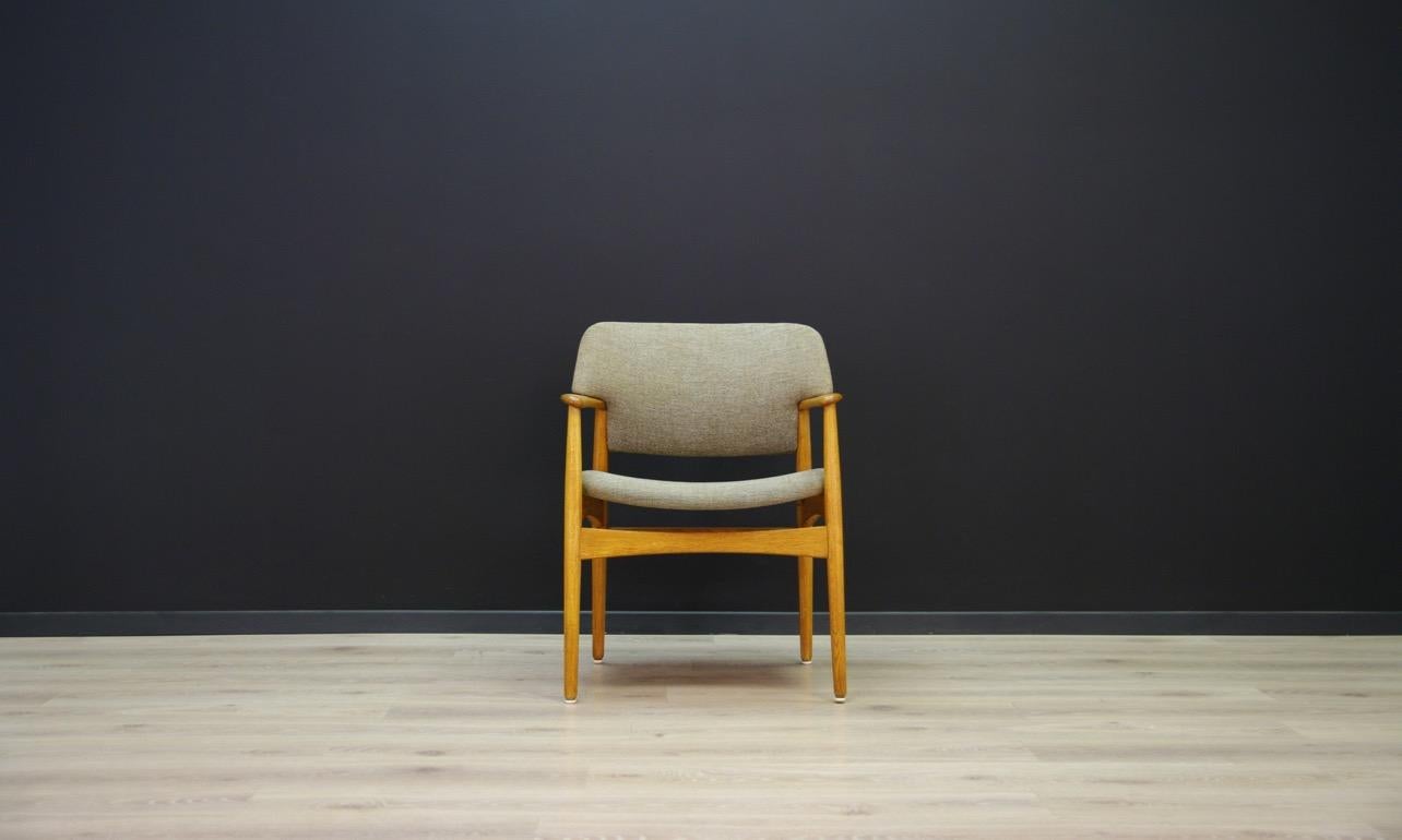 Original 1960s-1970s armchair, Minimalist form, Scandinavian design. Manufactured in the Fritz Hansen manufacture. Original upholstery (color - gray), construction and backs made of oak. Preserved in good condition (minor scratches on wooden