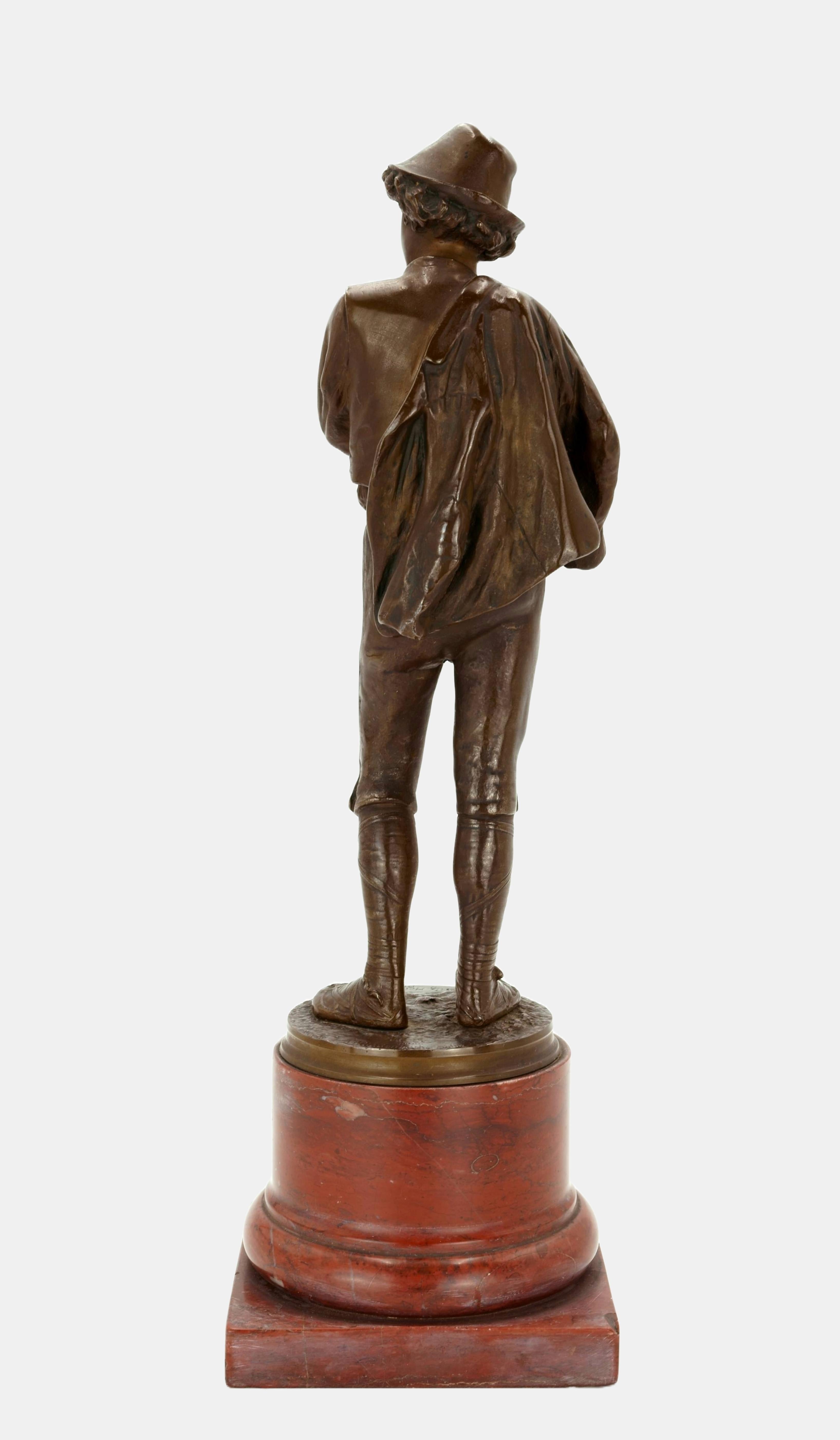 Fritz Heinemann (1864 Altena - 1932 Berlin), Young Roman, 1892. Brownish patinated bronze on a cast round plinth, mounted on a red marble base (8.5 cm high), total height 36 cm, dimensions of the bronze 27.5 cm (height) x 9 cm (length) x 8 cm