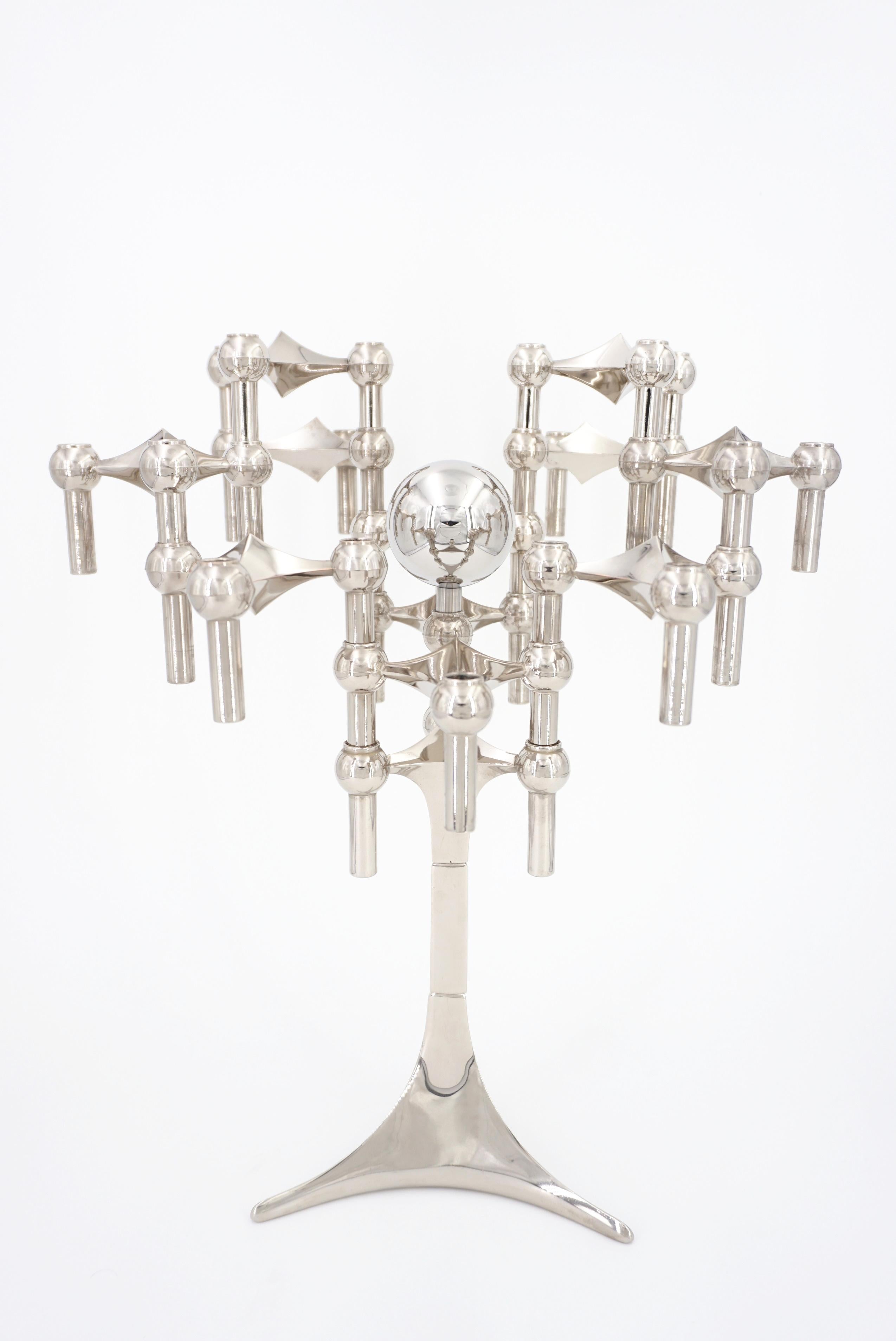Fritz Nagel 1970s design modular and chrome candleholder set composed of a tripode base, 11 candlesticks in which you could put up to 3 candles and a ball. High quality, amazing and highly decorative, infinitely modular, once you start the