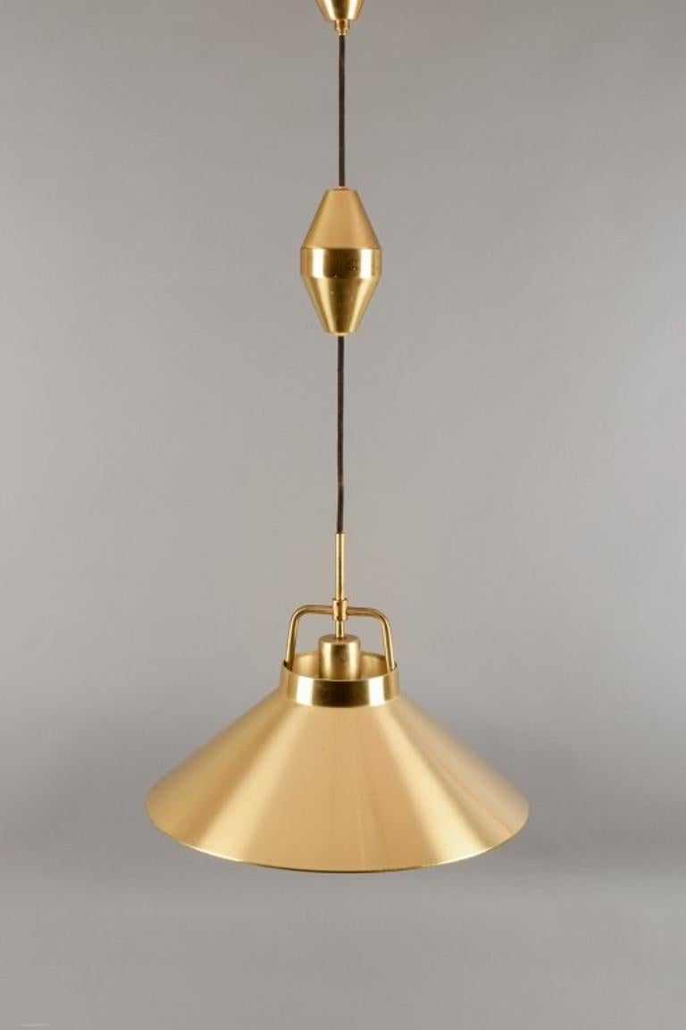 Fritz Schlegel, Danish designer, for Lyfa. Ceiling lamp in brass.
1960s/70s.
Stylish Danish design.
In excellent condition with minimal signs of use.
Label.
Dimensions: D 44.0 cm.